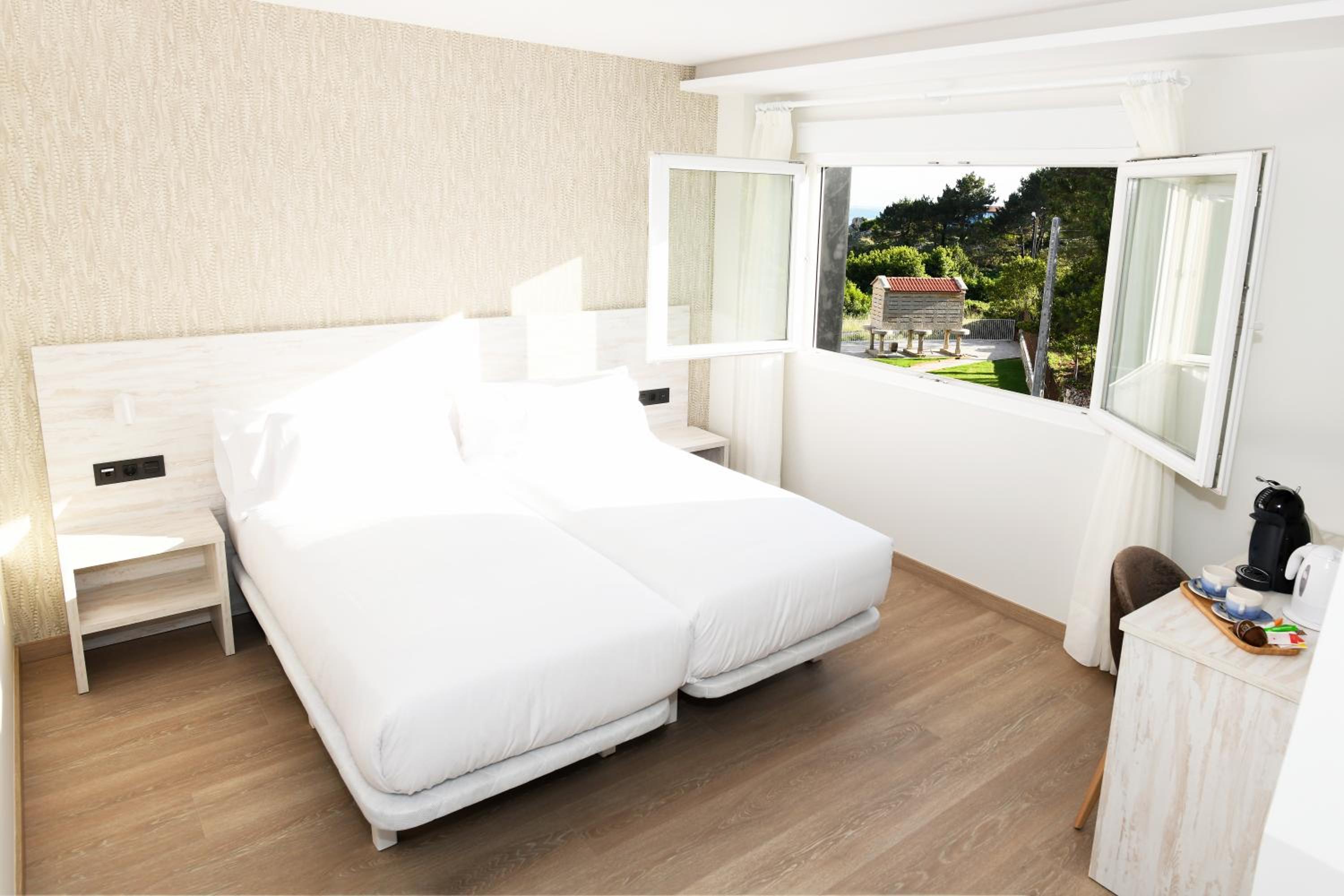Habitación Doble Estándar o con Dos Camas Individuales.