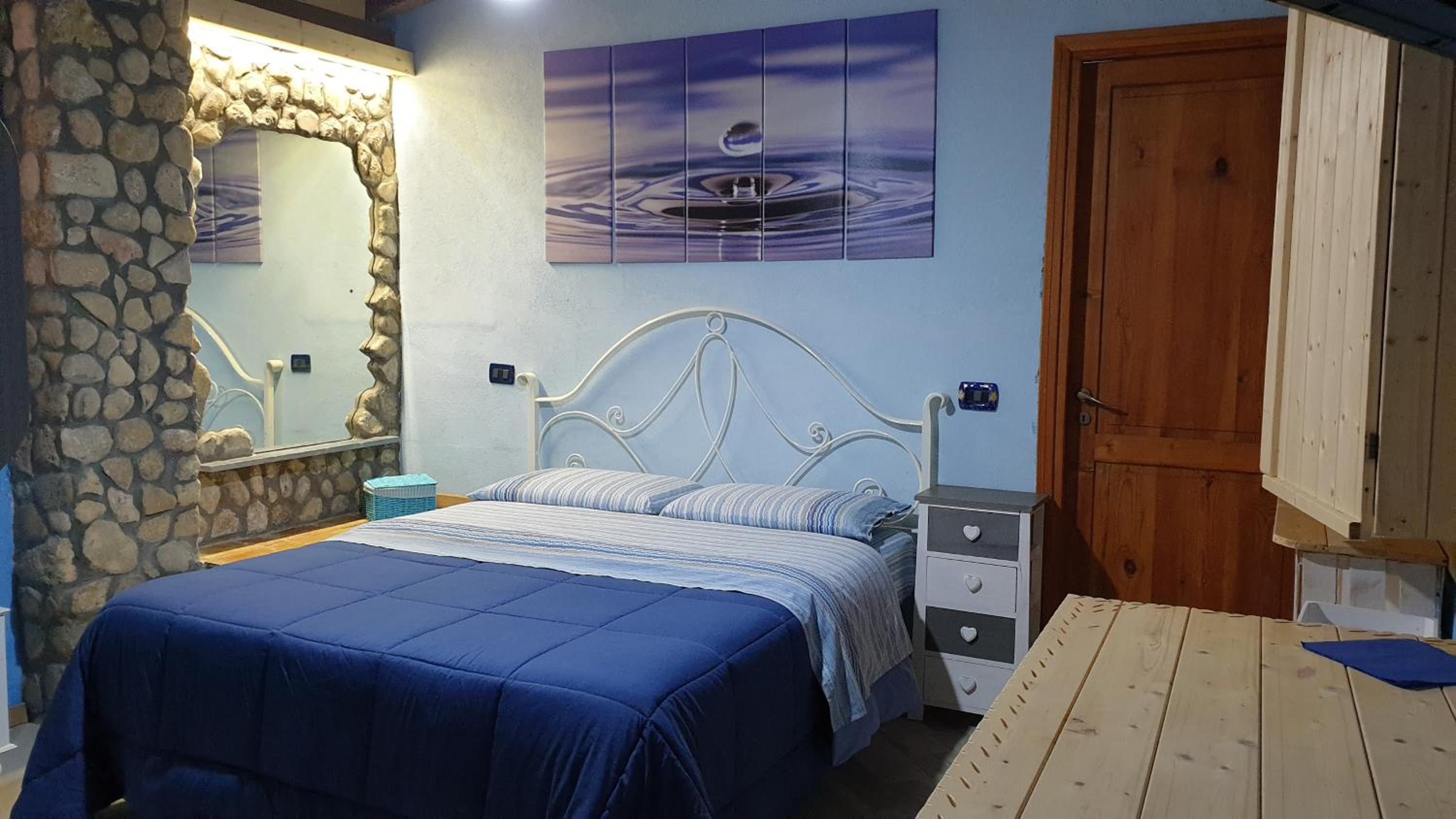 Quadruple Room with Private Bathroom
