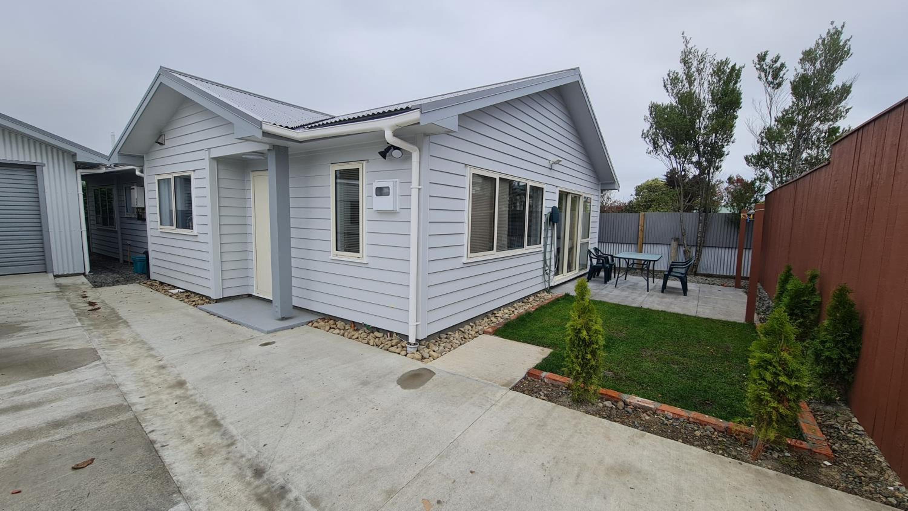 Three-Bedroom House - Photo 21