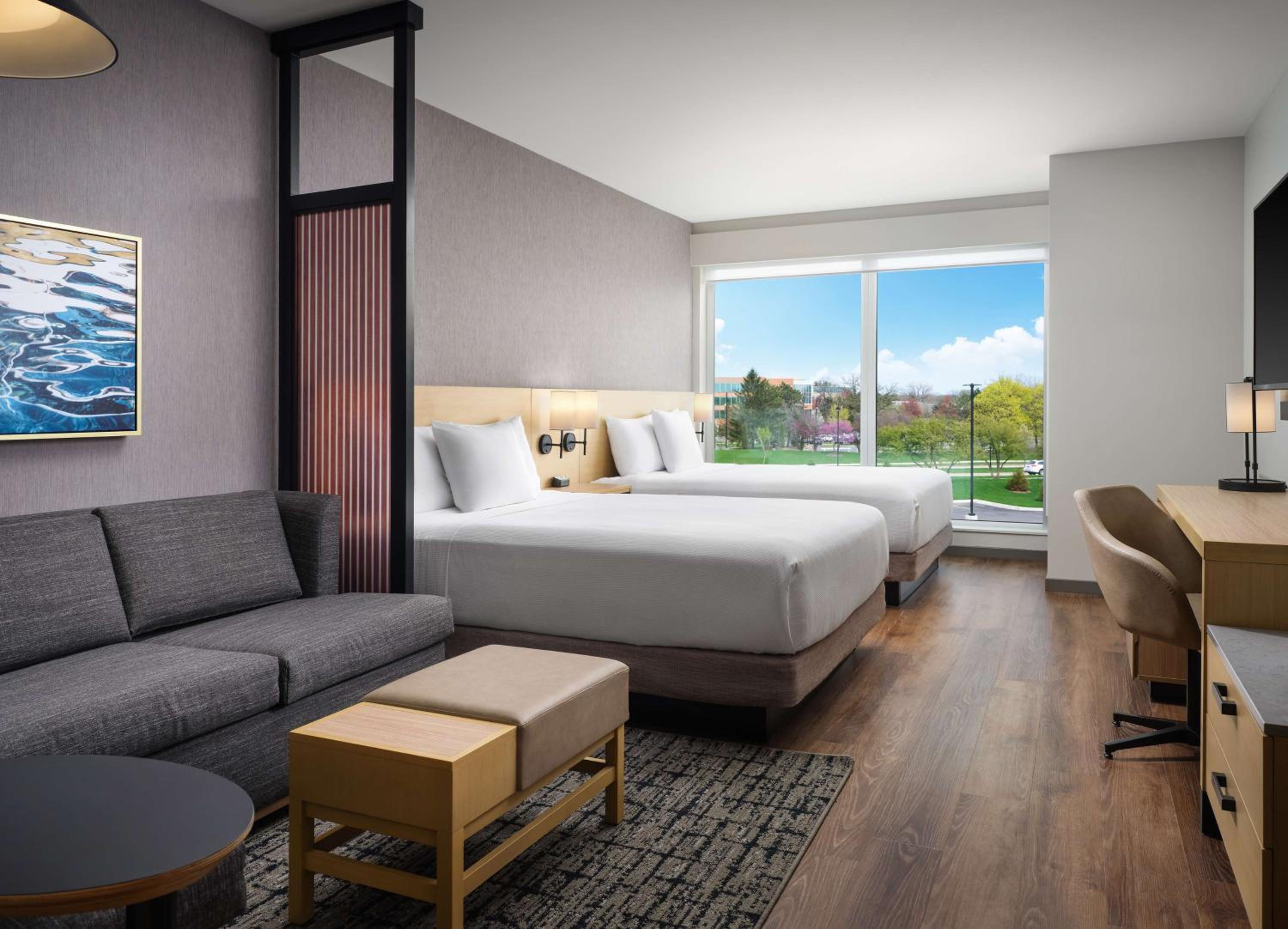 Queen Room with Two Queen Beds and Sofa Bed - Photo 7