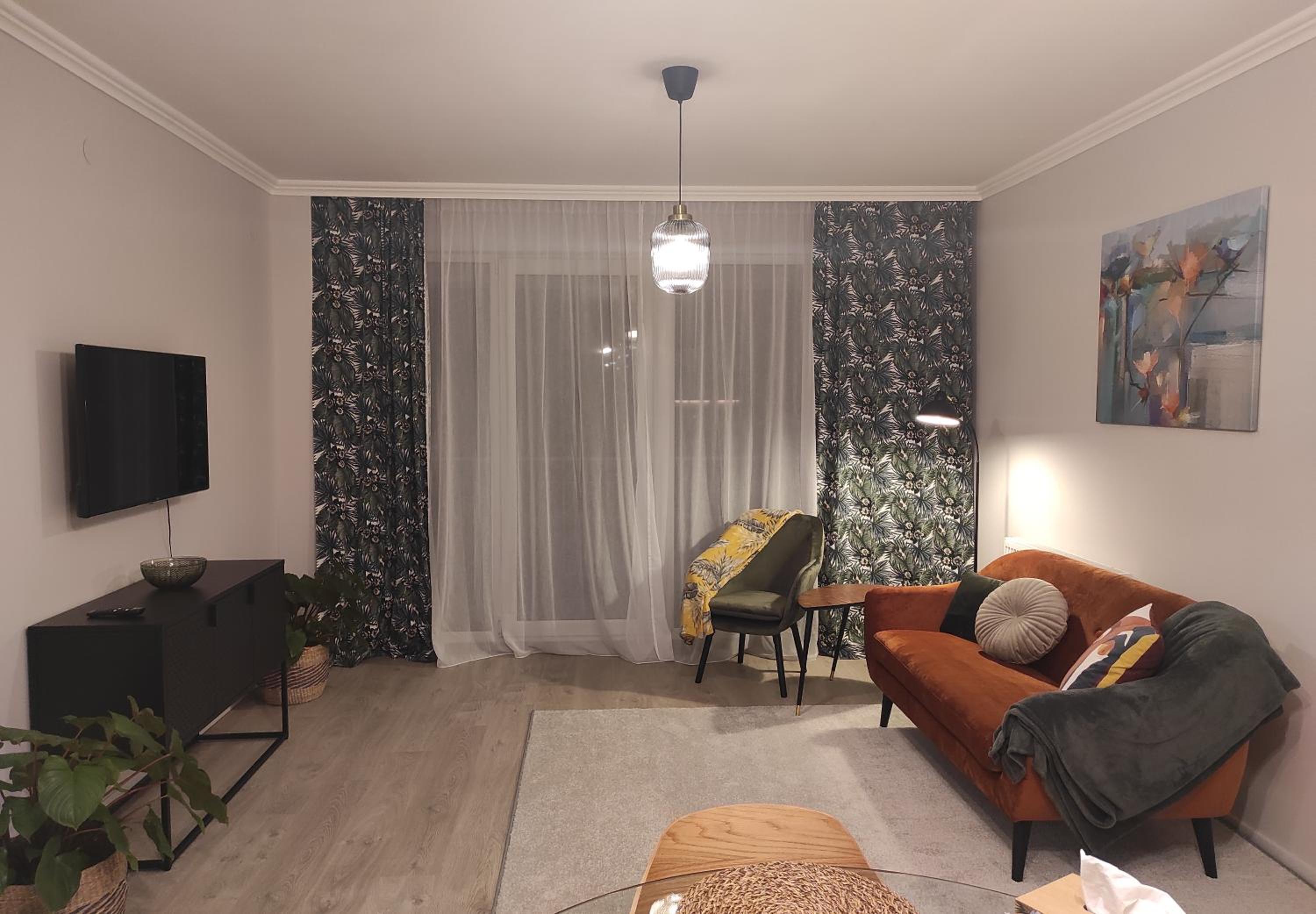 One-Bedroom Apartment with Balcony and City View