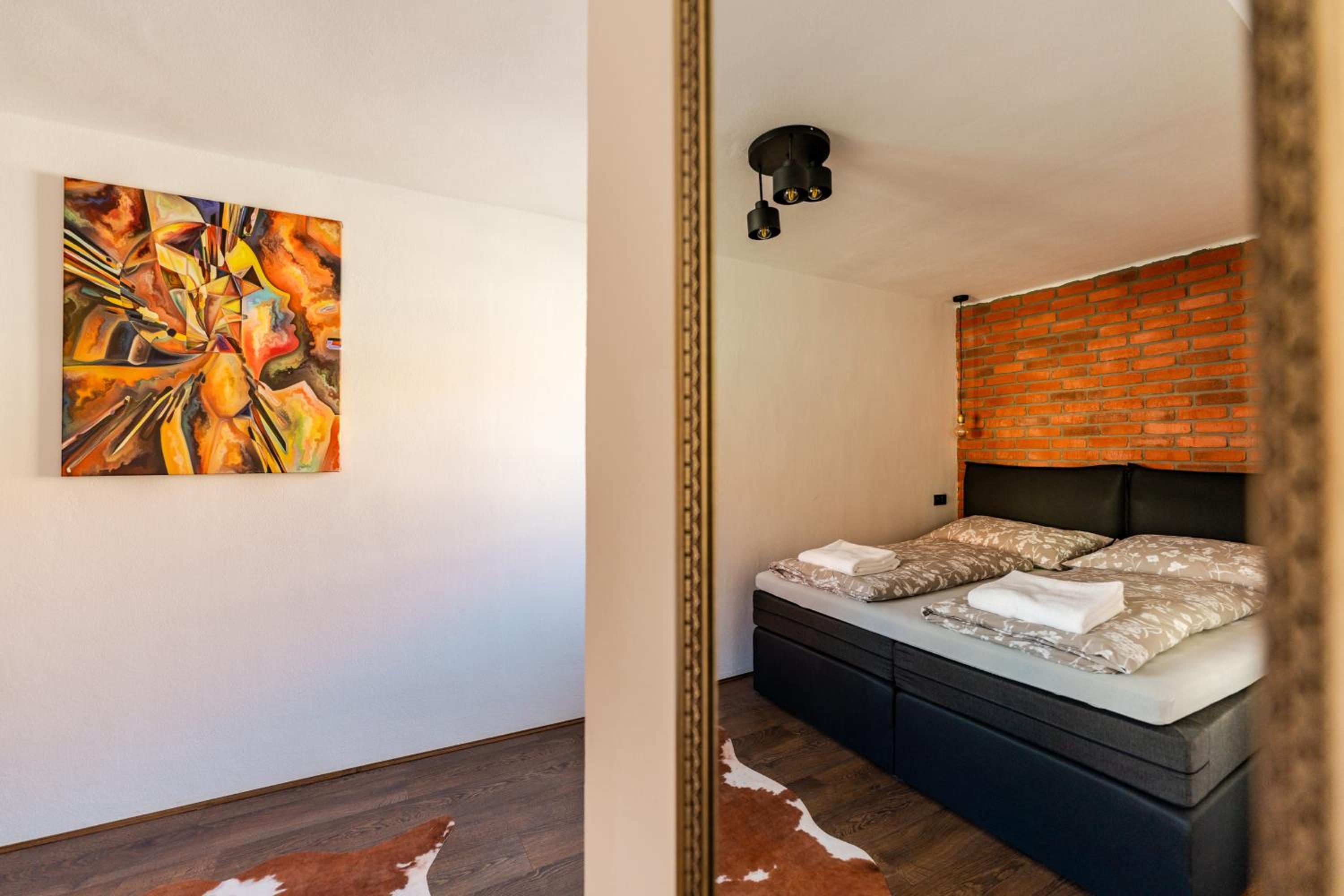 Deluxe Double Room (2 Adults + 1 Child) - Photo 1