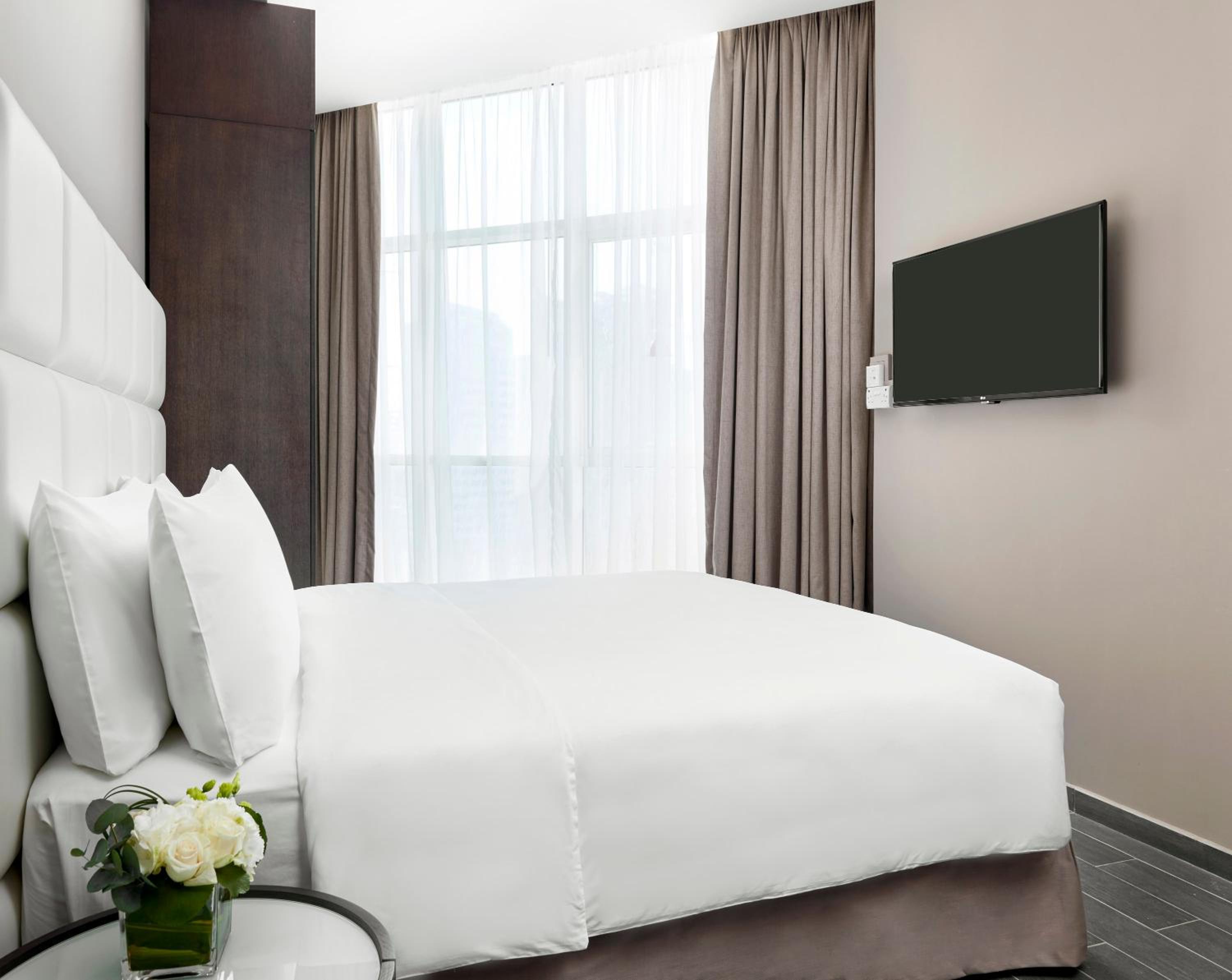 One-Bedroom King Suite with City View and Balcony