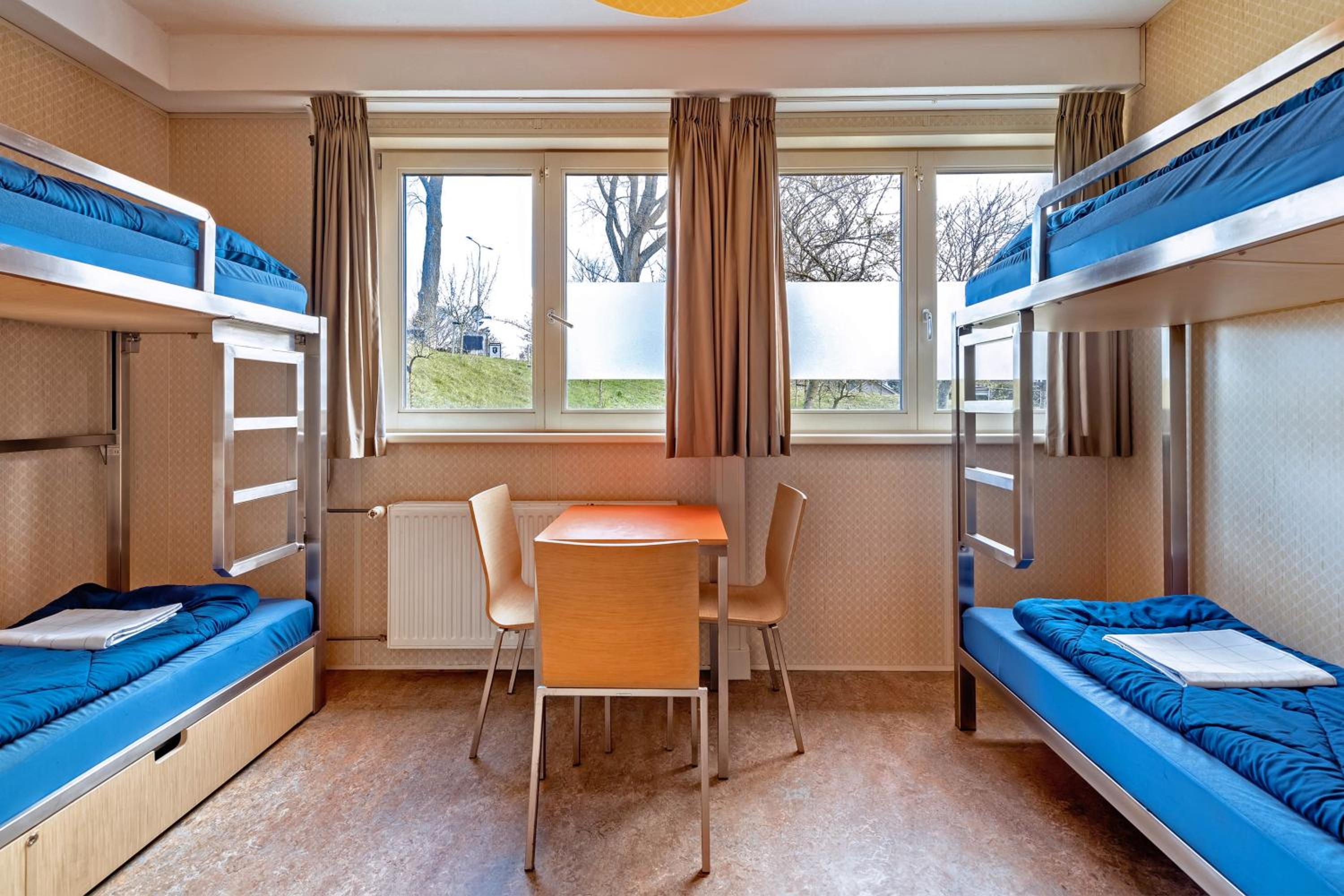 Quadruple Room with Private Bathroom