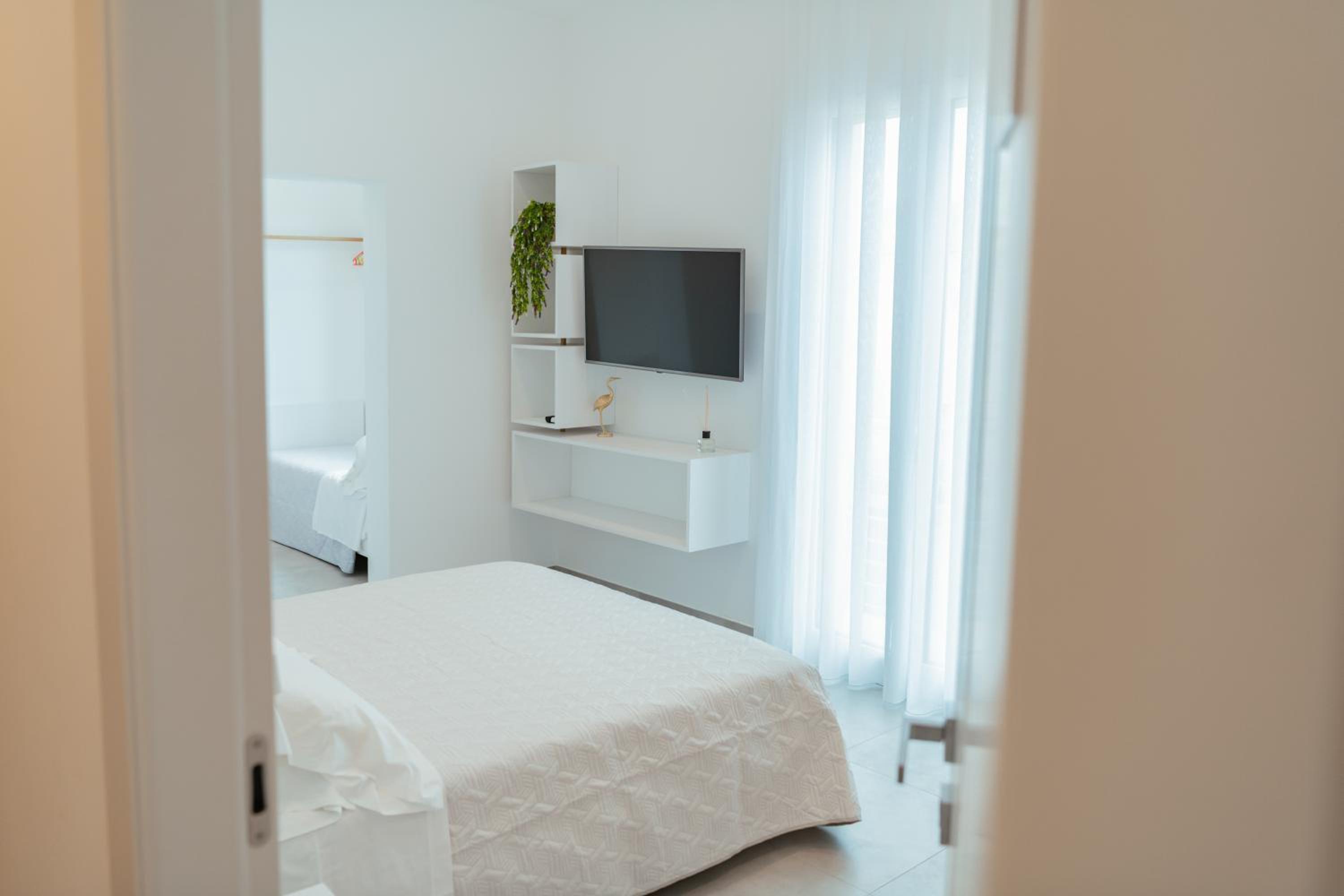 Quadruple Room - Photo 13