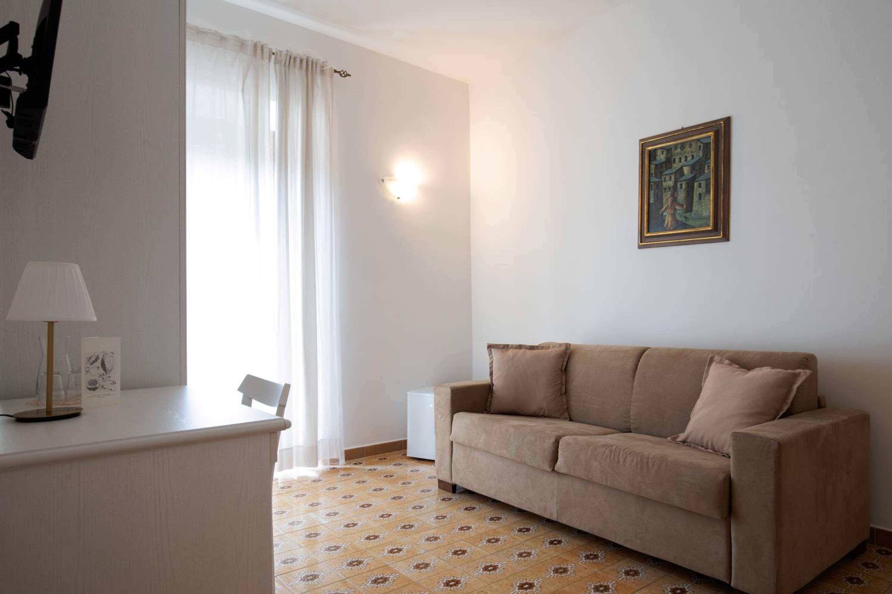 Quadruple Room - Photo 22