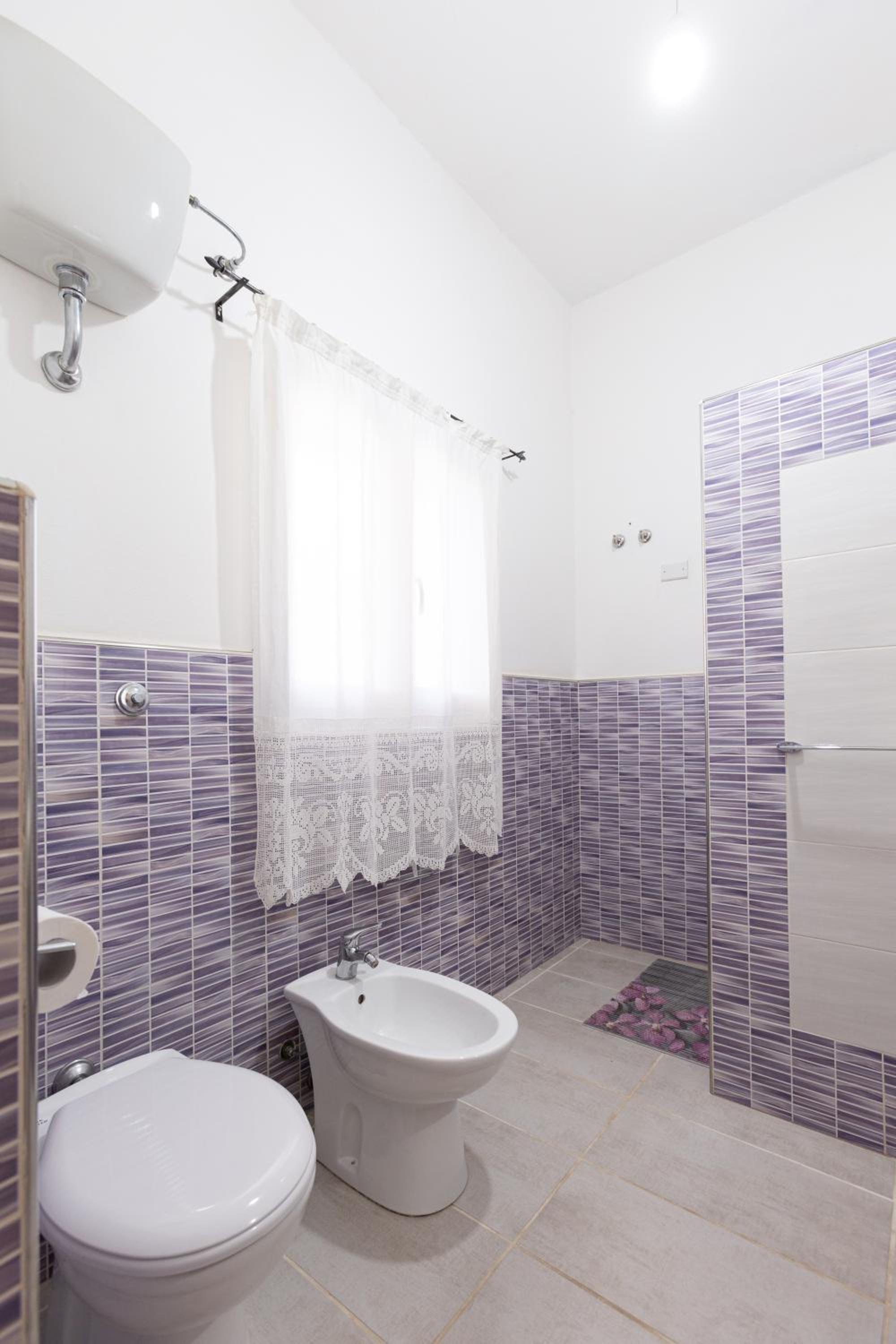 Three-Bedroom Apartment - Photo 7