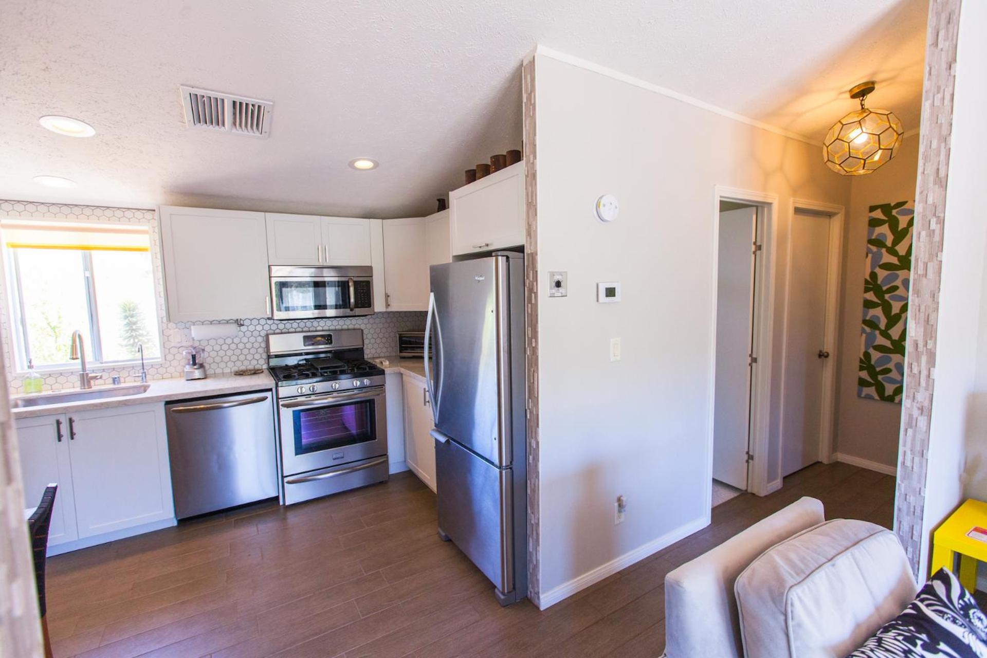 Three-Bedroom House - Photo 16