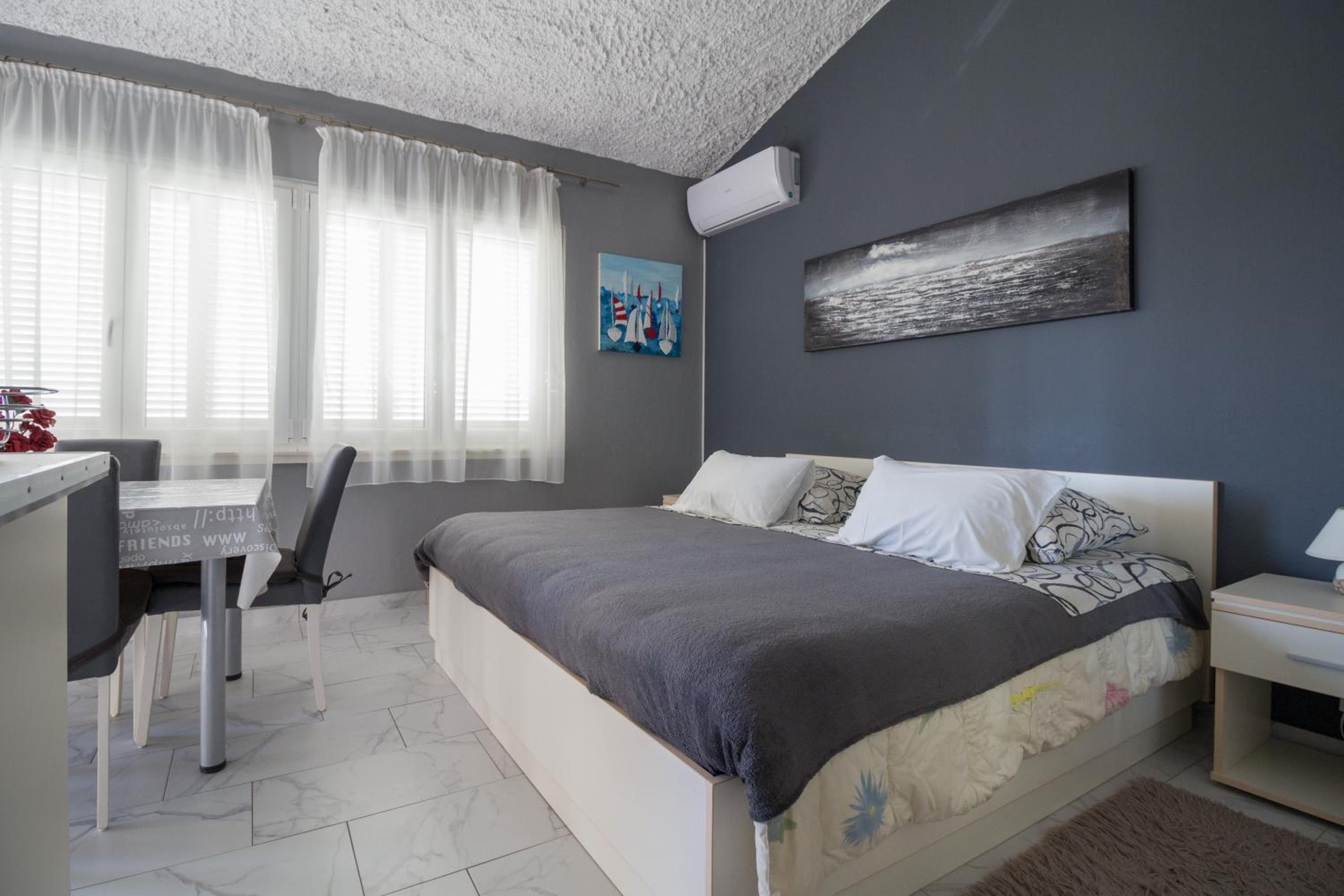 Digital Nomads Package - Two-Bedroom Apartment with Free Airport Shuttle & Office Equipment photo 1