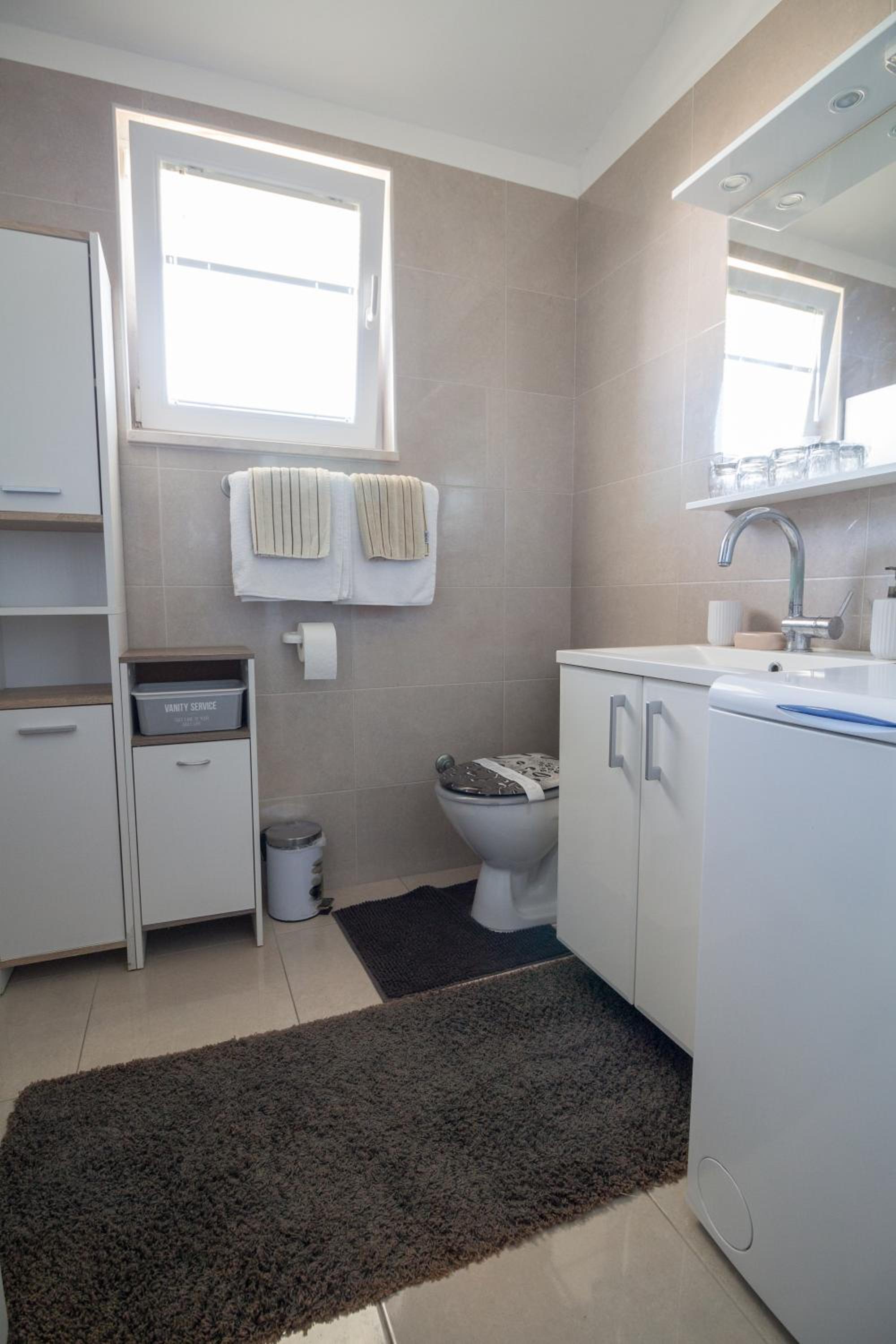 Digital Nomads Package - Two-Bedroom Apartment with Free Airport Shuttle & Office Equipment photo 2
