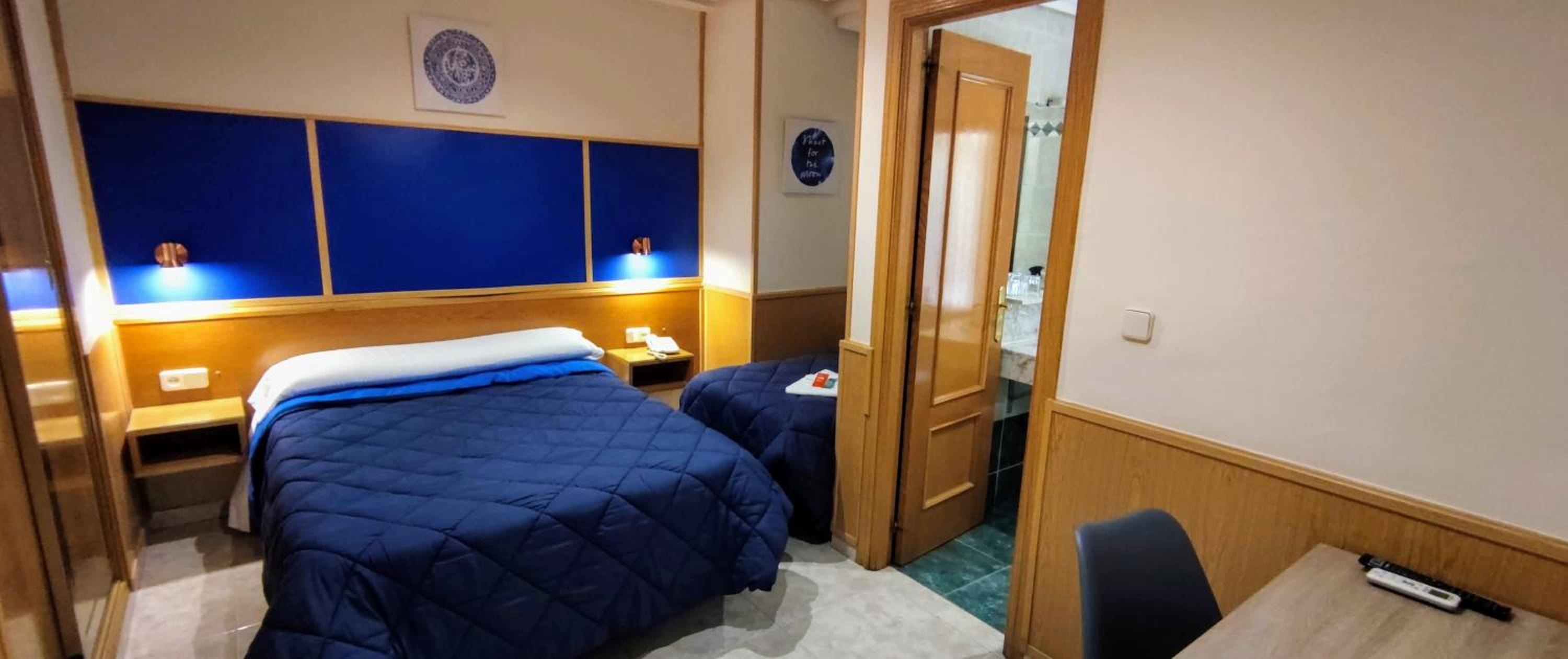 Triple Room - Photo 1