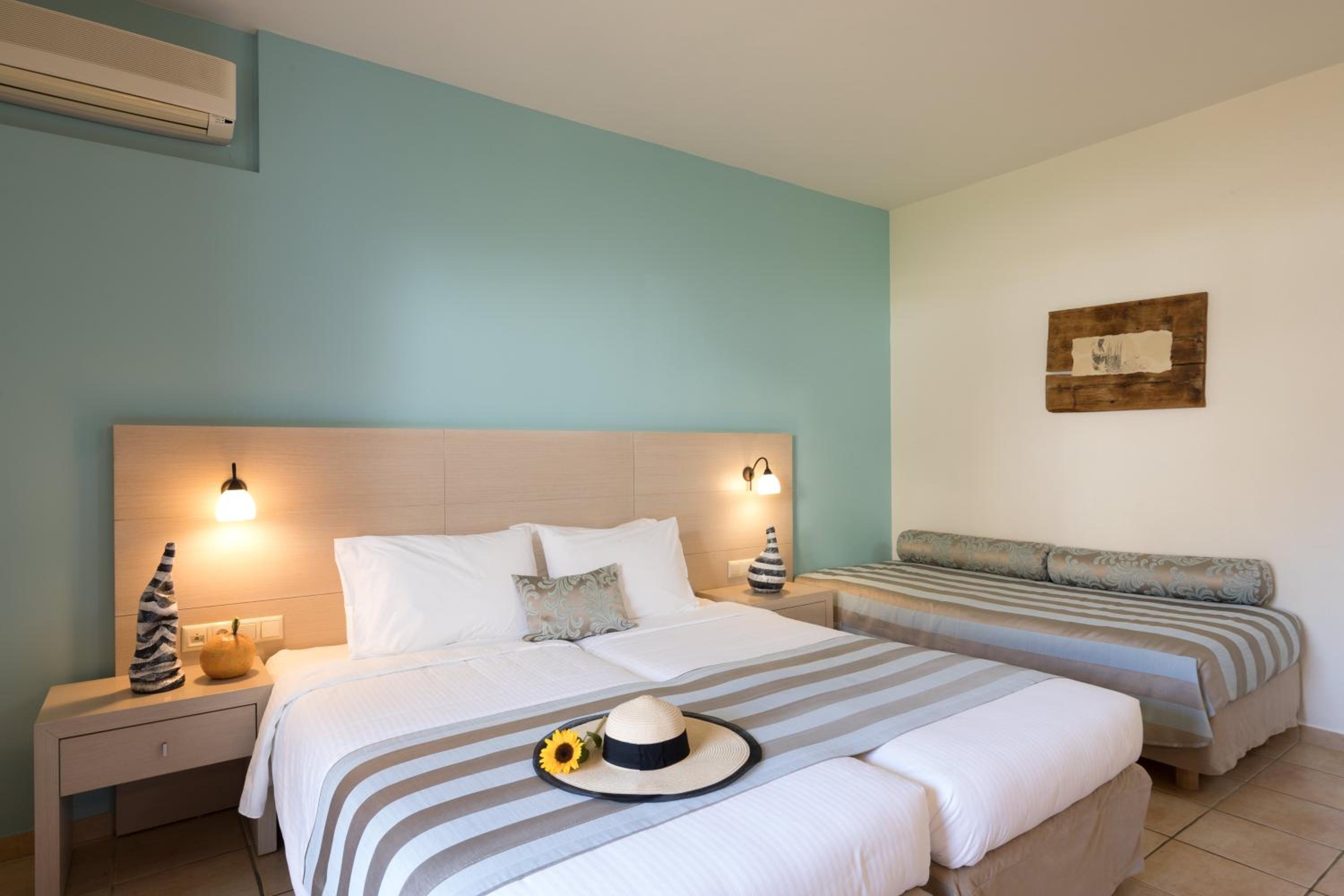 Superior Triple Room With Side Sea View