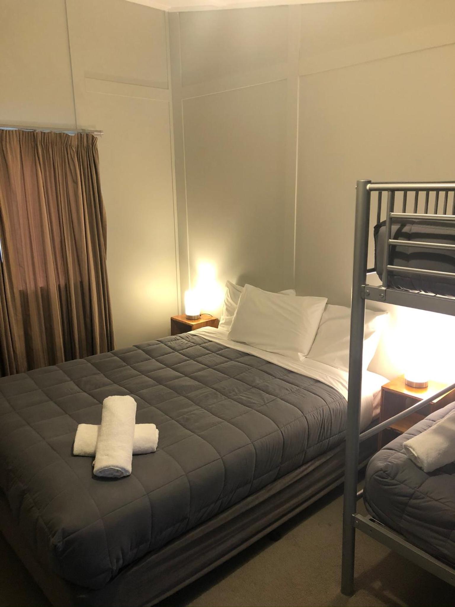 Queen Room with 1 Queen Bed and 2 Bunk Beds photo 2