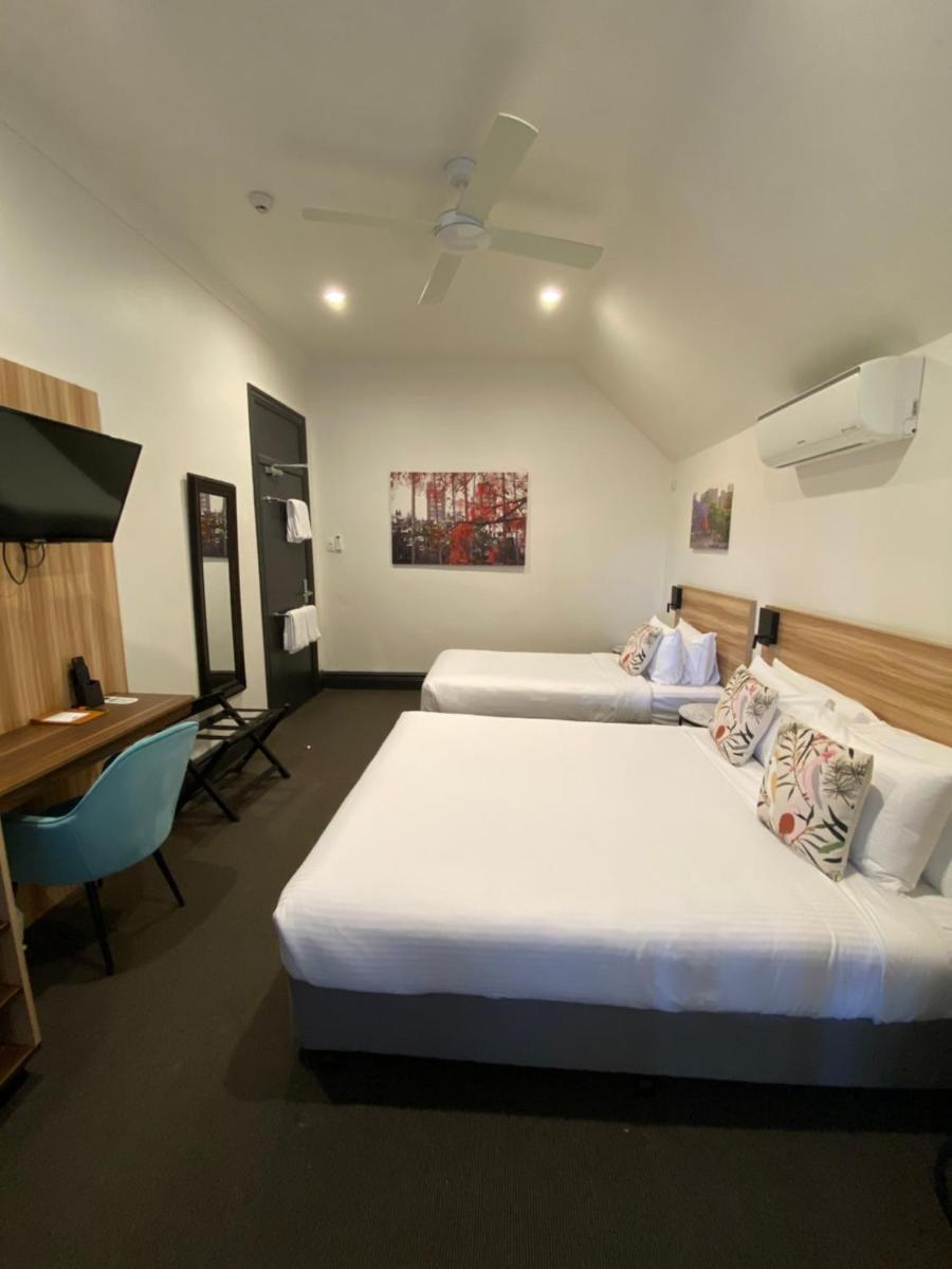 Family Suite with Balcony and Shared Bathroom