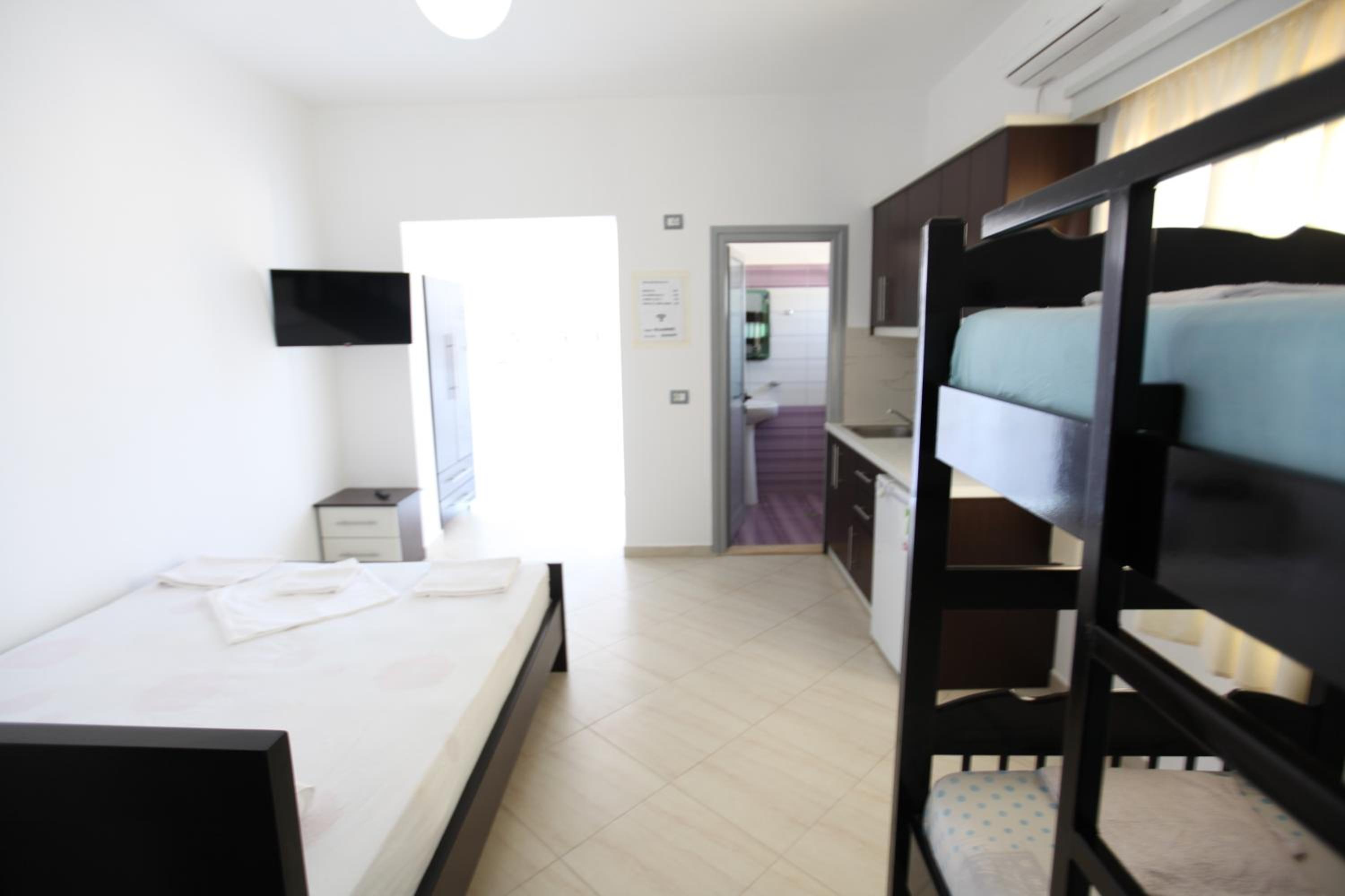 Quadruple Room with Balcony photo 1
