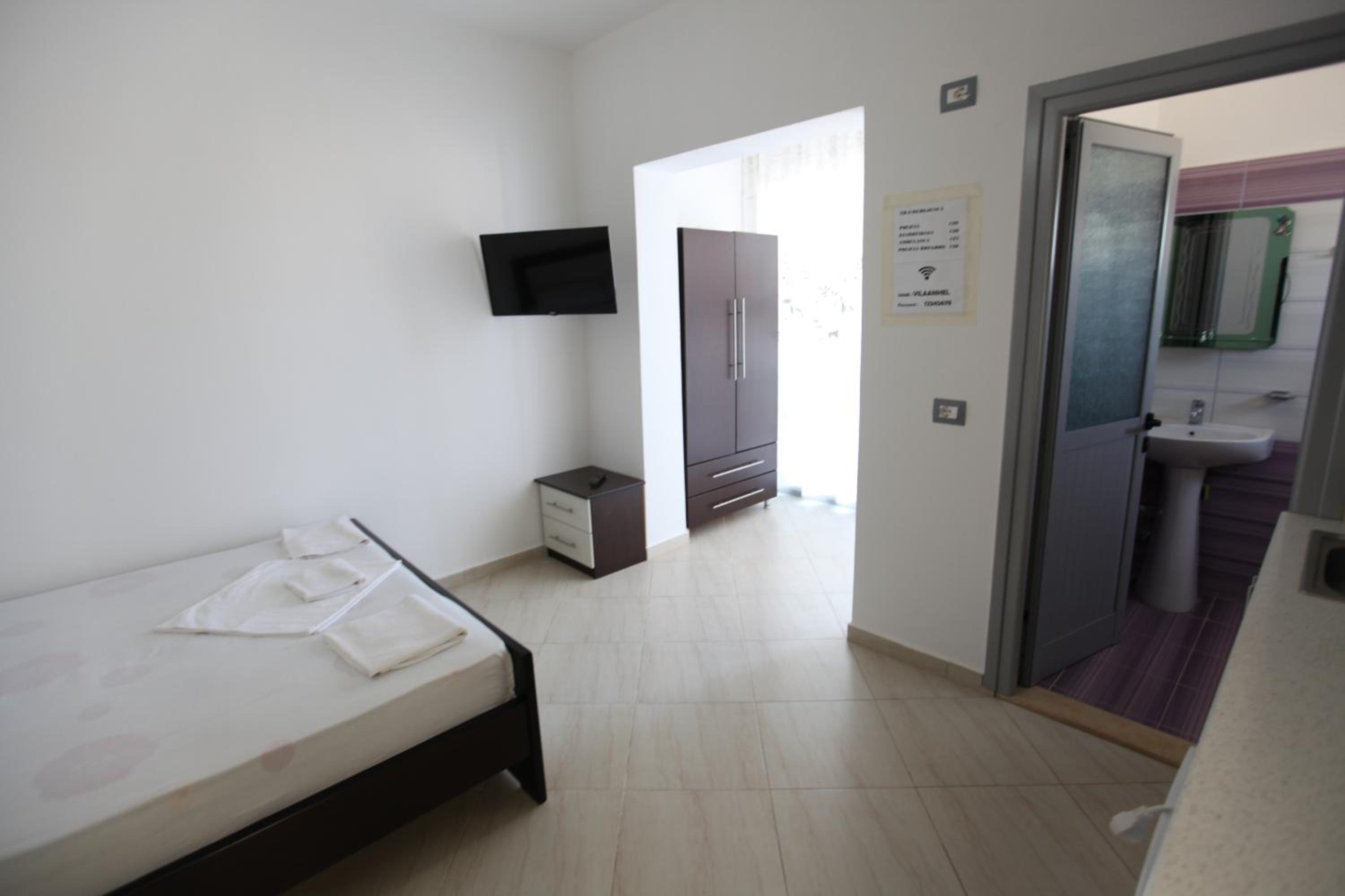 Quadruple Room with Balcony photo 3