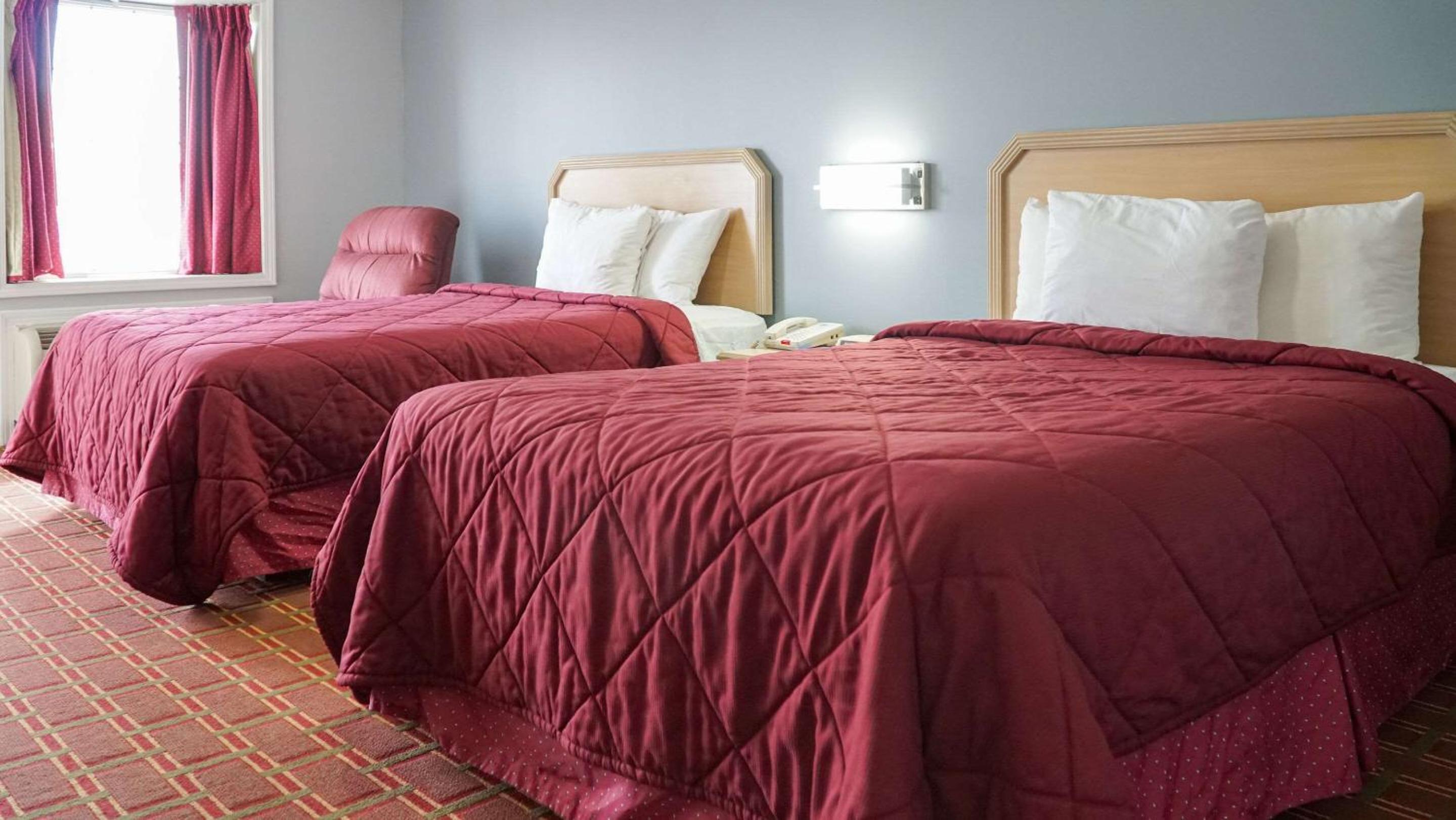 Double Room with Two Double Beds - Accessible/Smoking - Photo 1