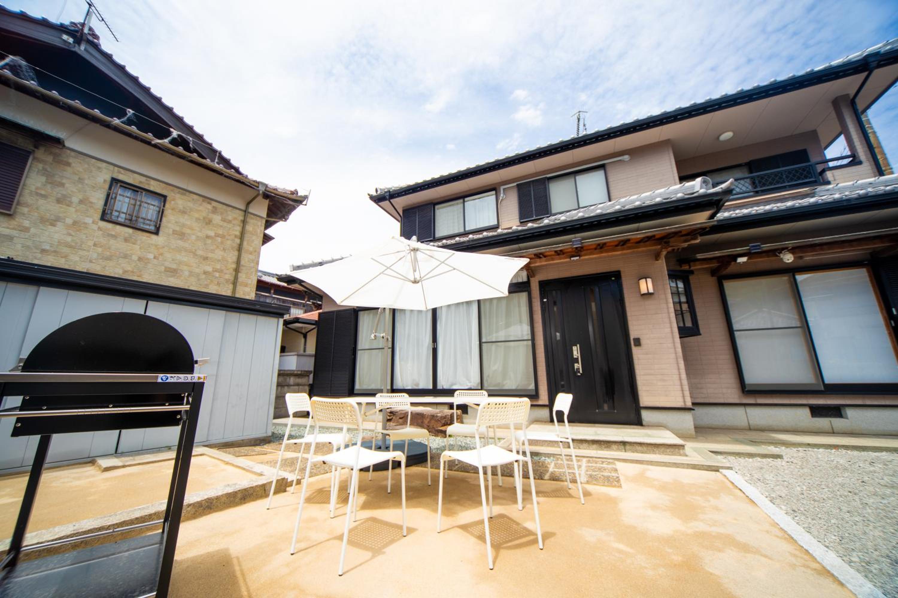 Three-Bedroom House - Photo 57