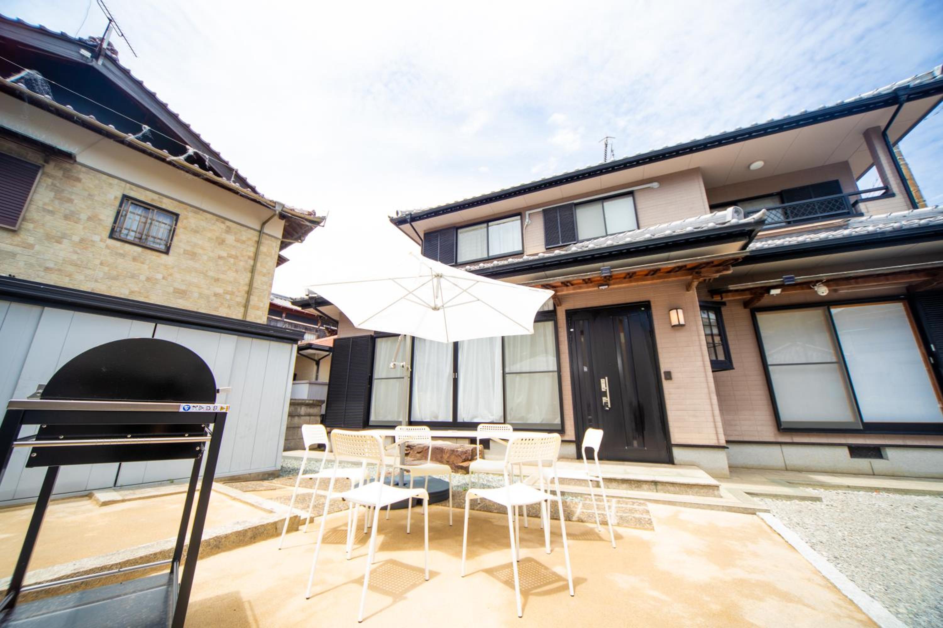 Three-Bedroom House - Photo 53