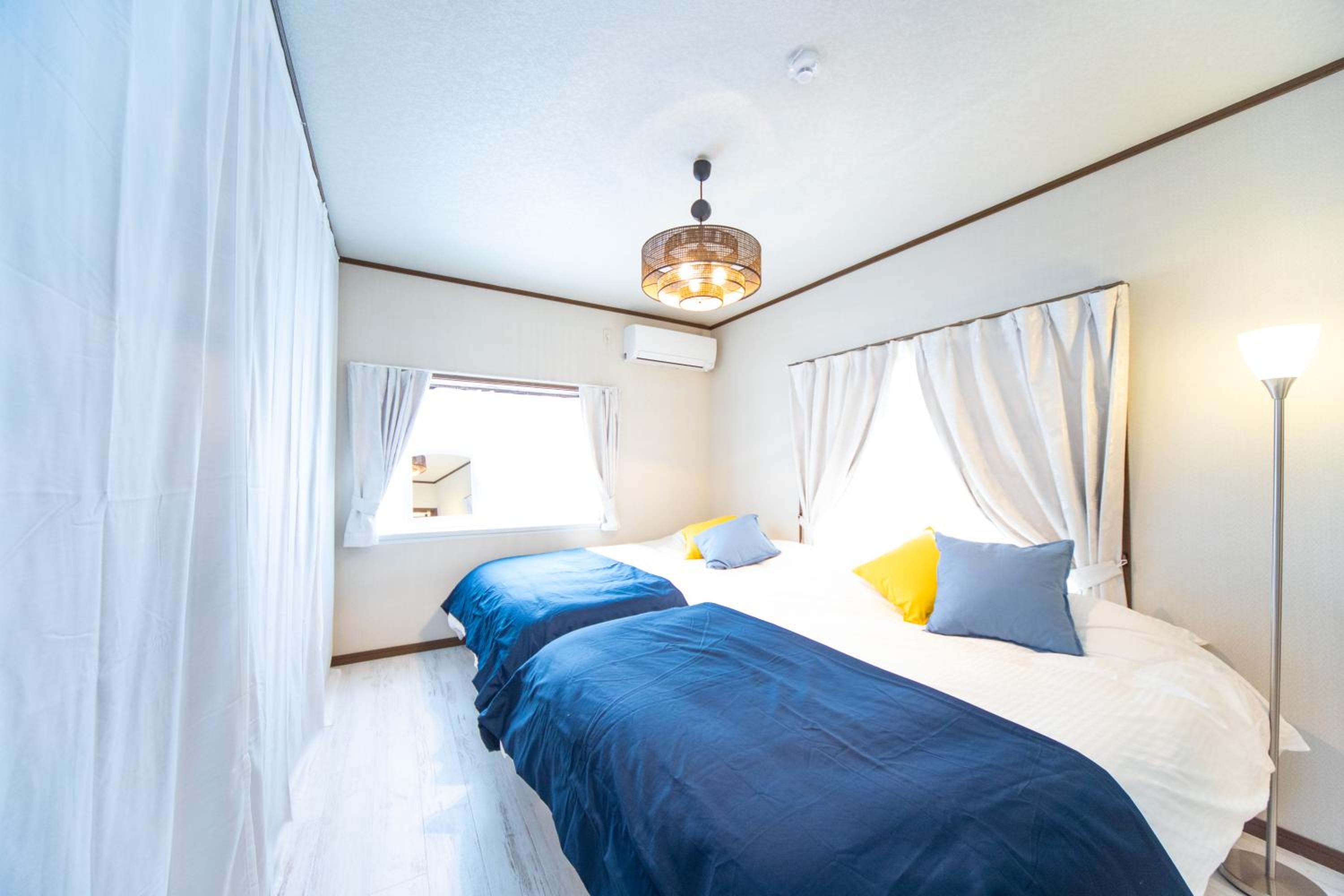 Three-Bedroom House - Photo 48