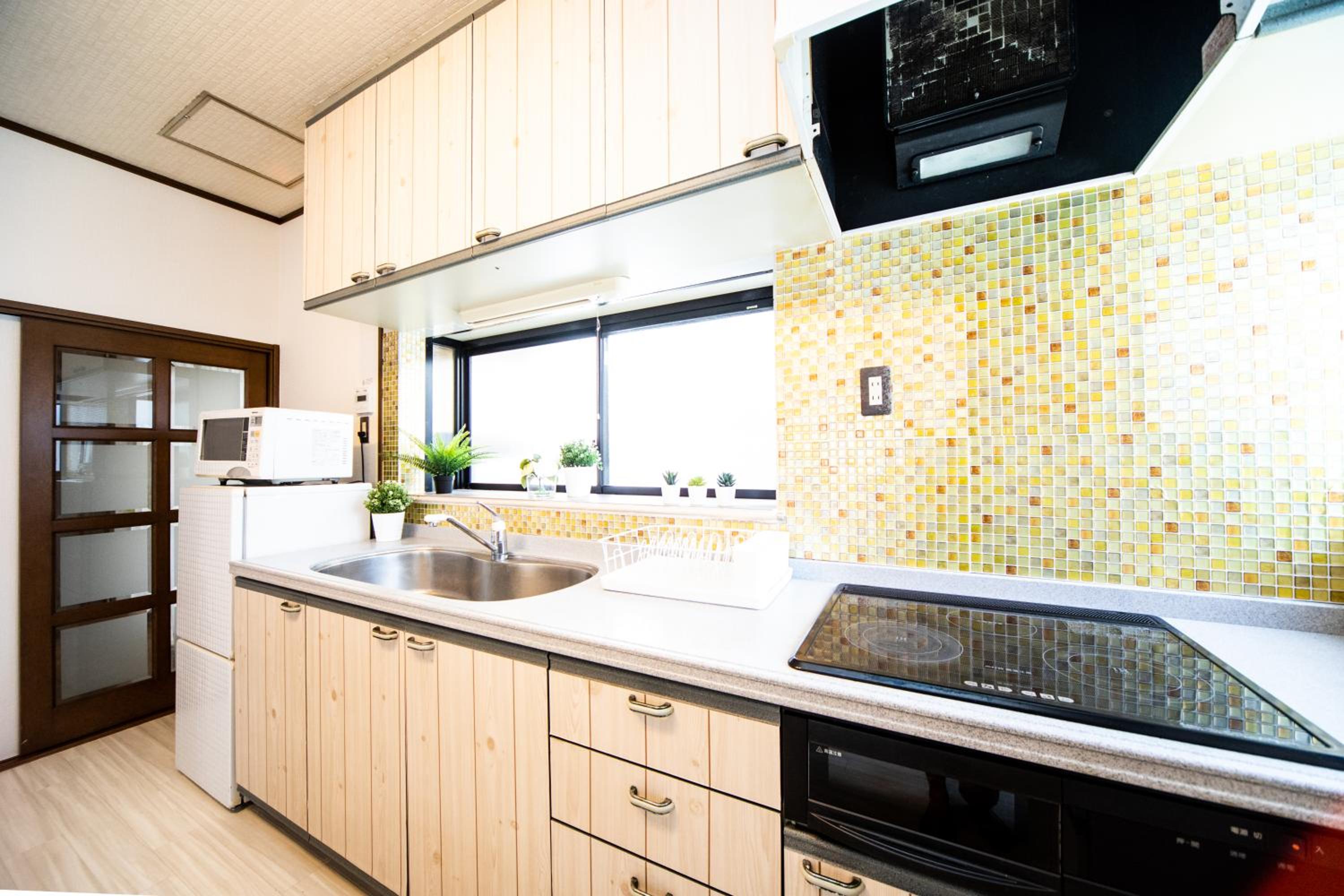 Three-Bedroom House - Photo 44