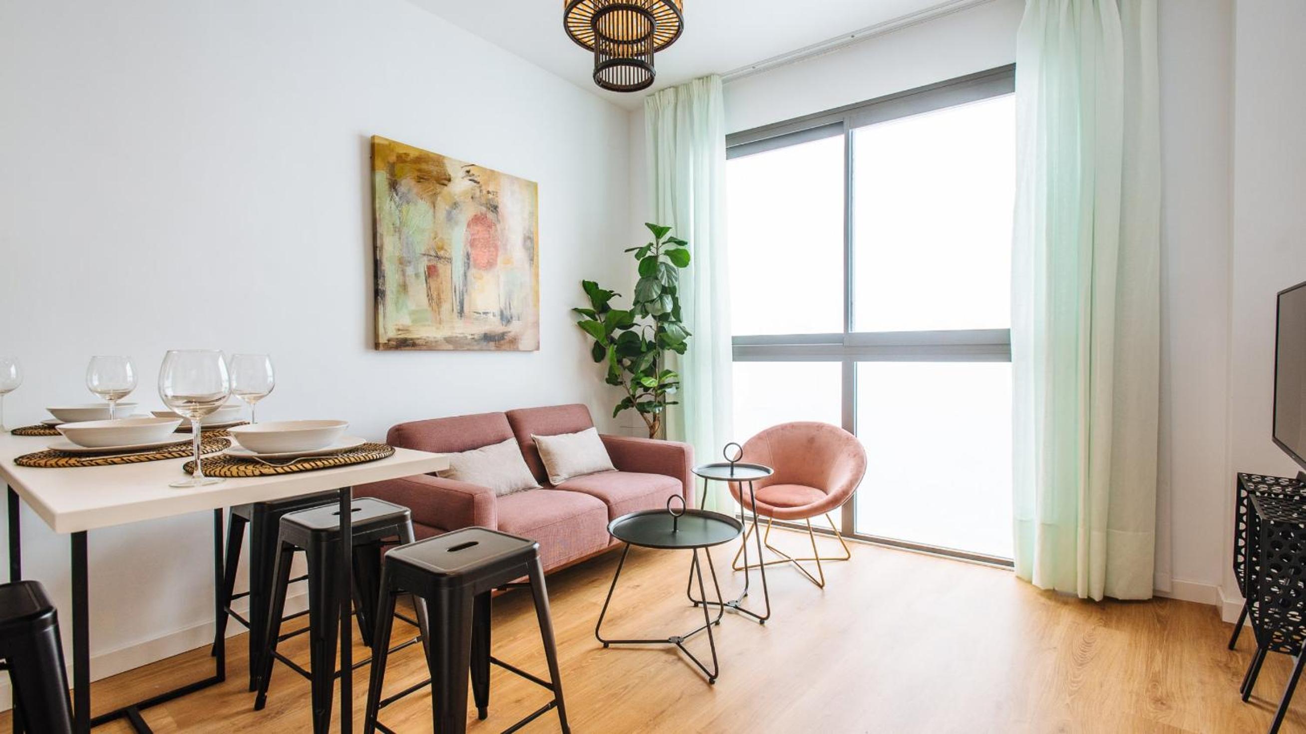 Two-bedroom apartment with shared Jacuzzi on common terrace.