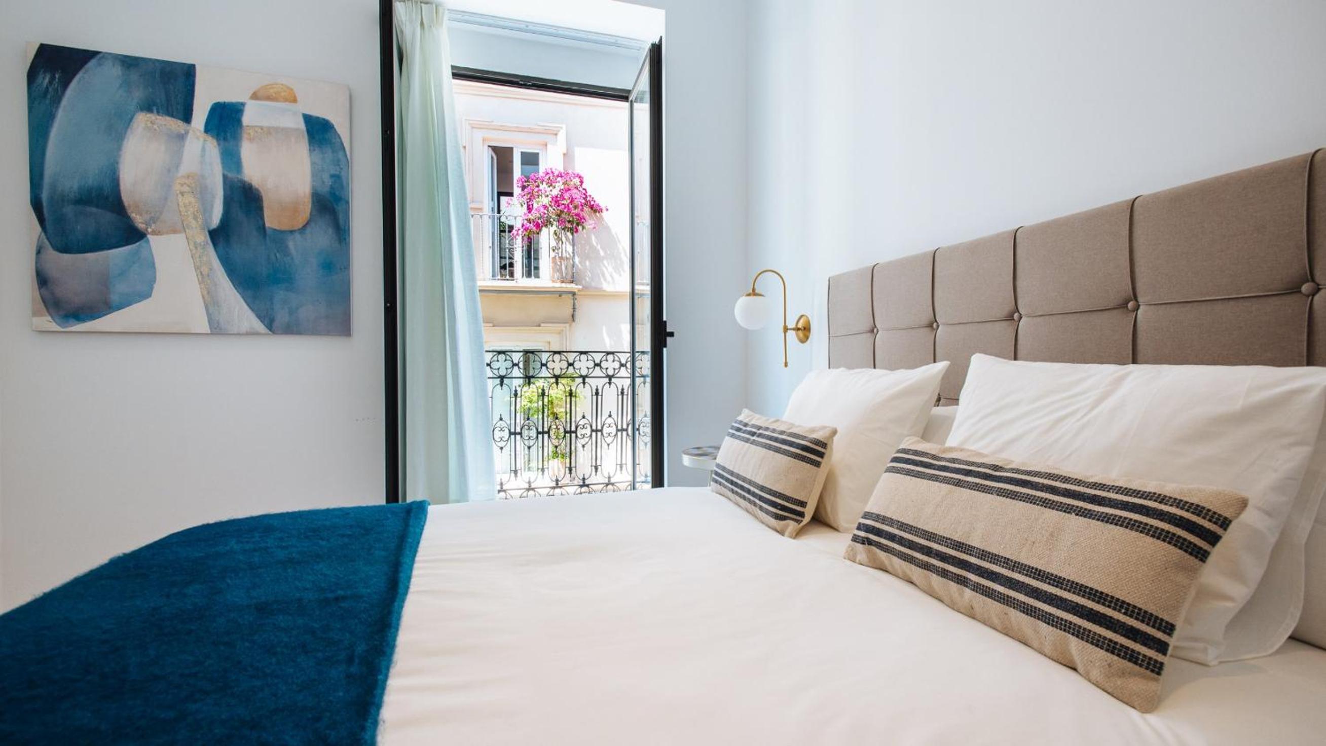 Two-bedroom apartment with shared Jacuzzi on common terrace.