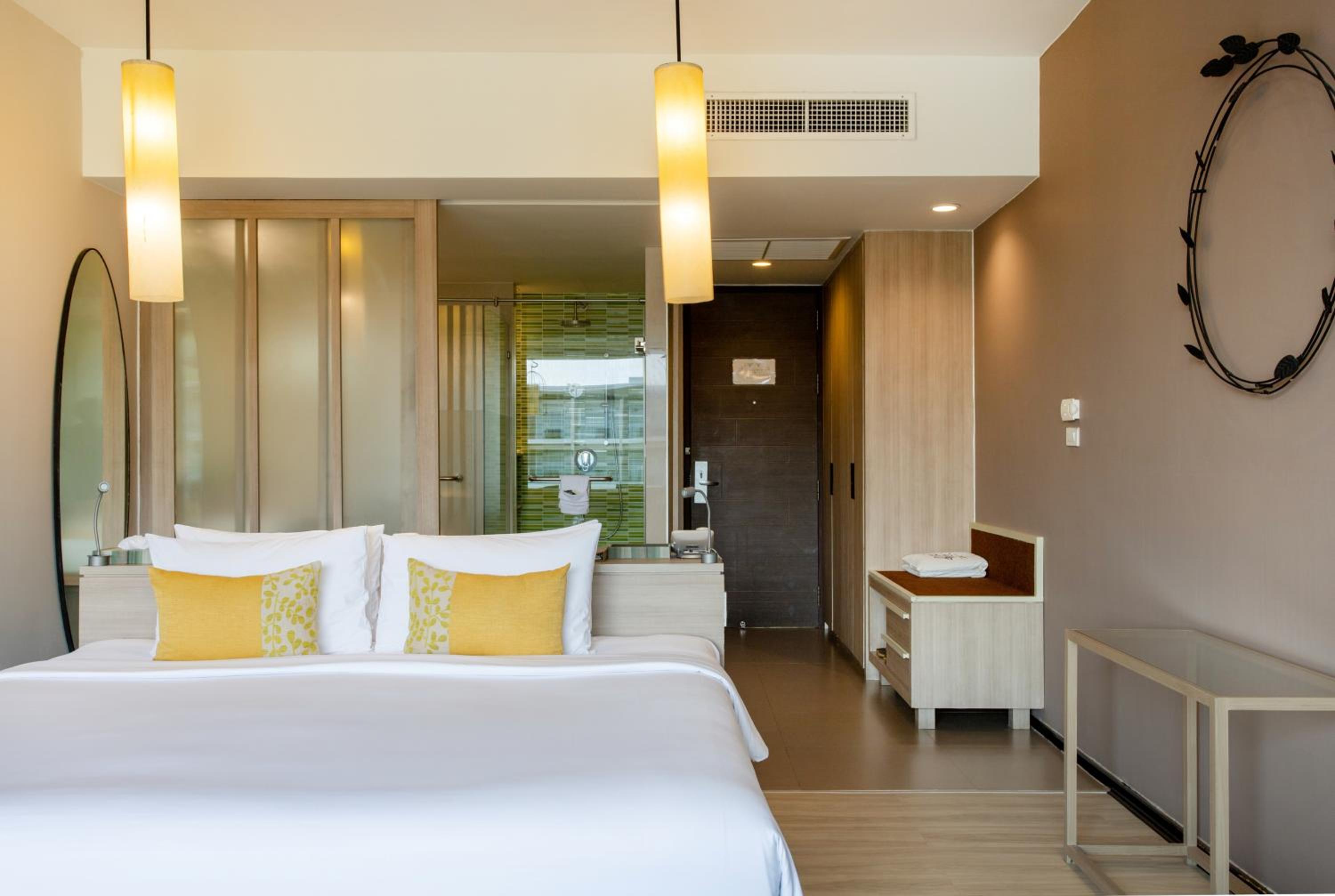 Your serene escape awaits in this cozy hotel room!