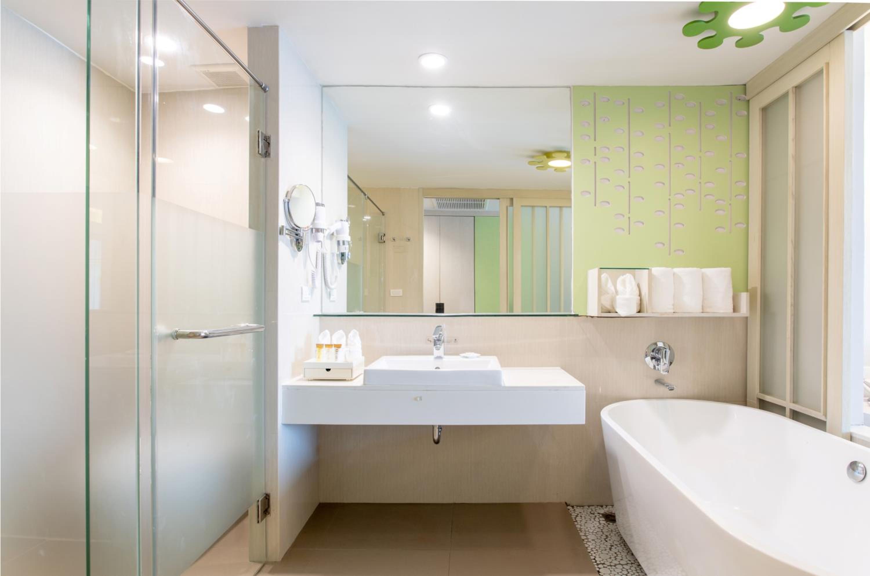 Relax in this modern and stylish bathroom retreat.