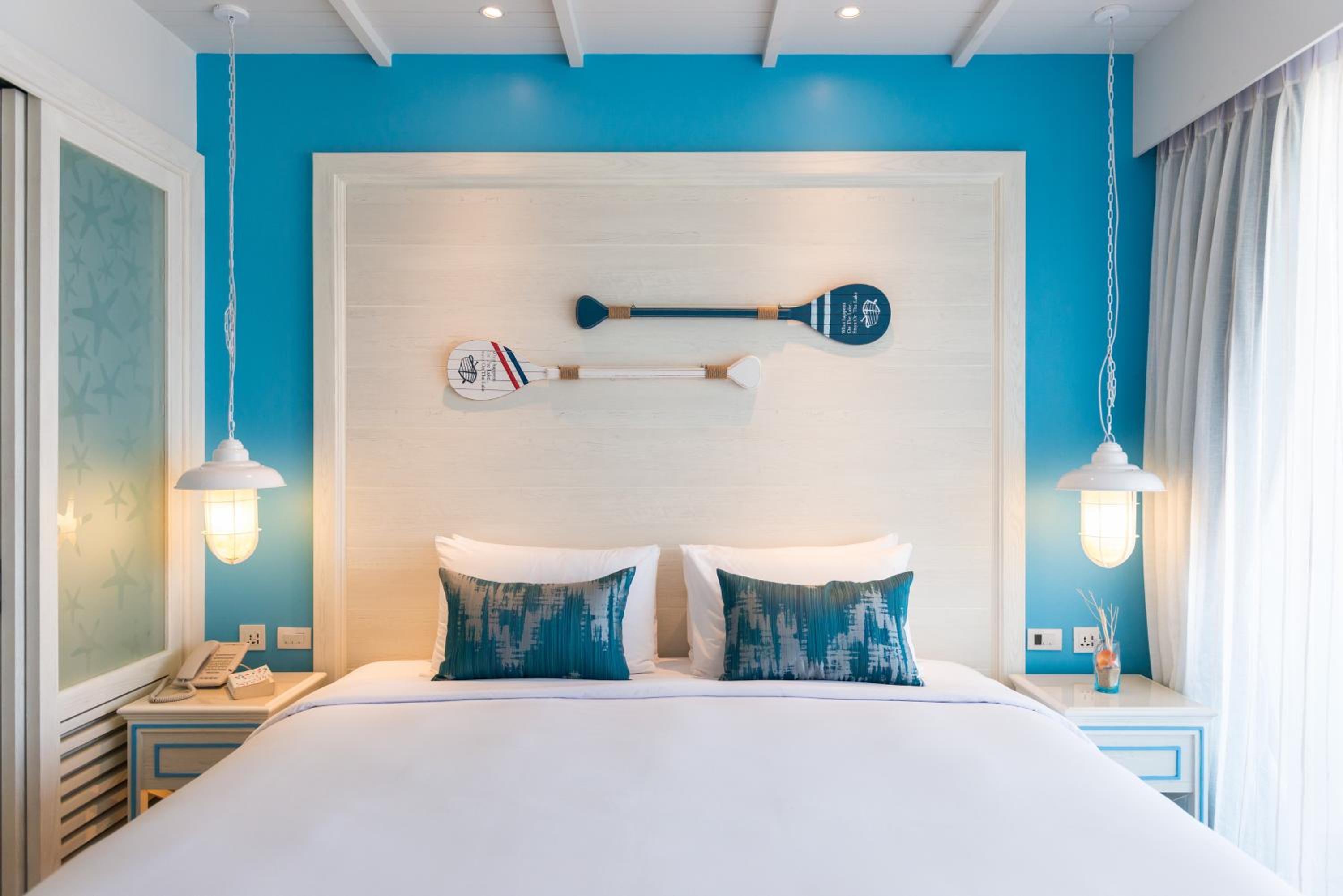 Cozy retreat with vibrant coastal decor awaits you!