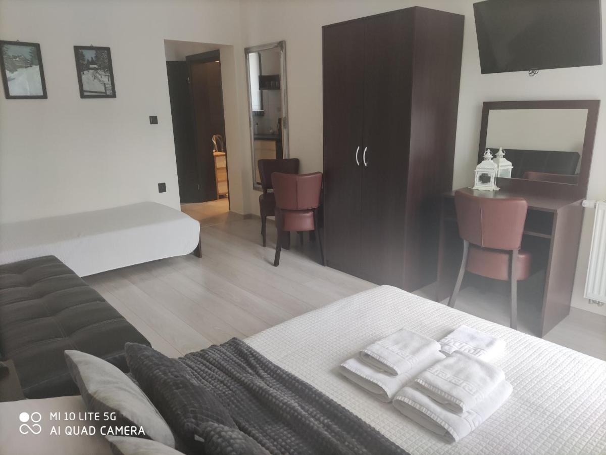 Deluxe Triple Room - Photo 7