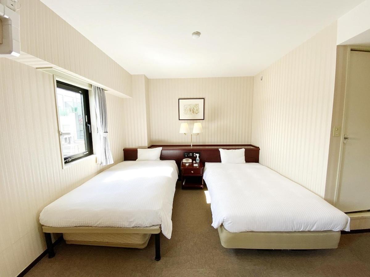 Twin Room - Non-Smoking - Photo 1