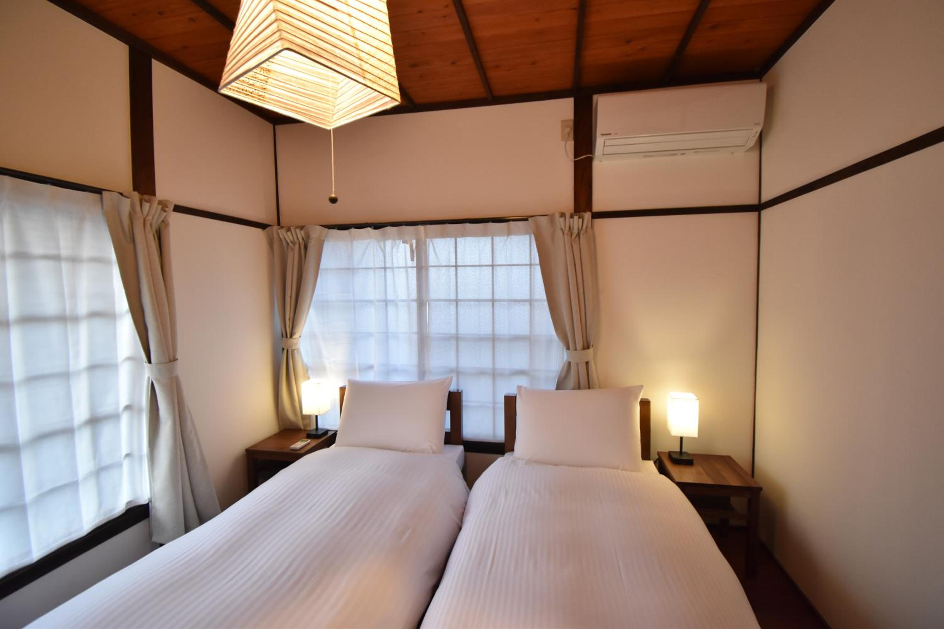 Twin Room with Private Bathroom - Photo 1