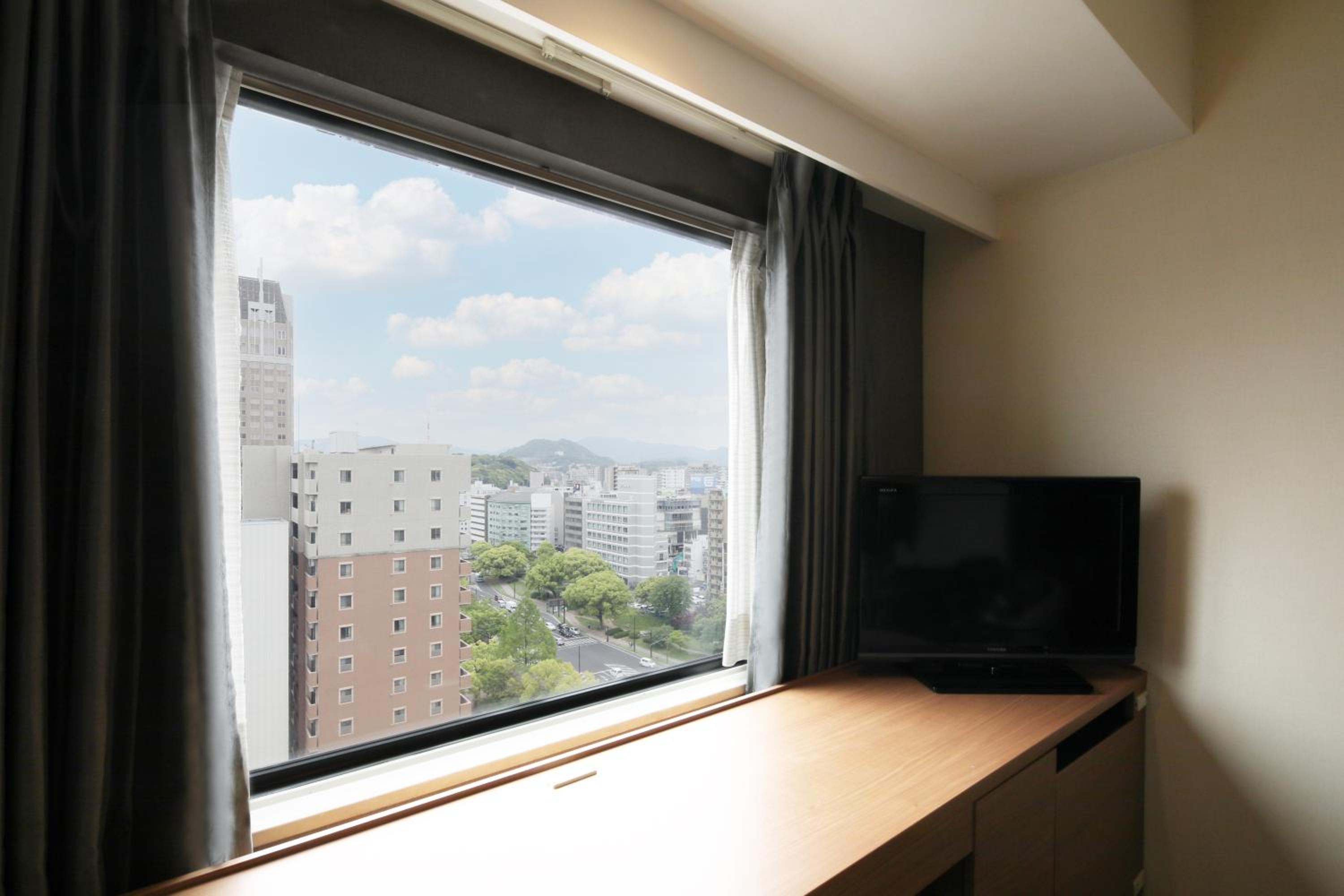Single Room - Non-Smoking - Photo 14