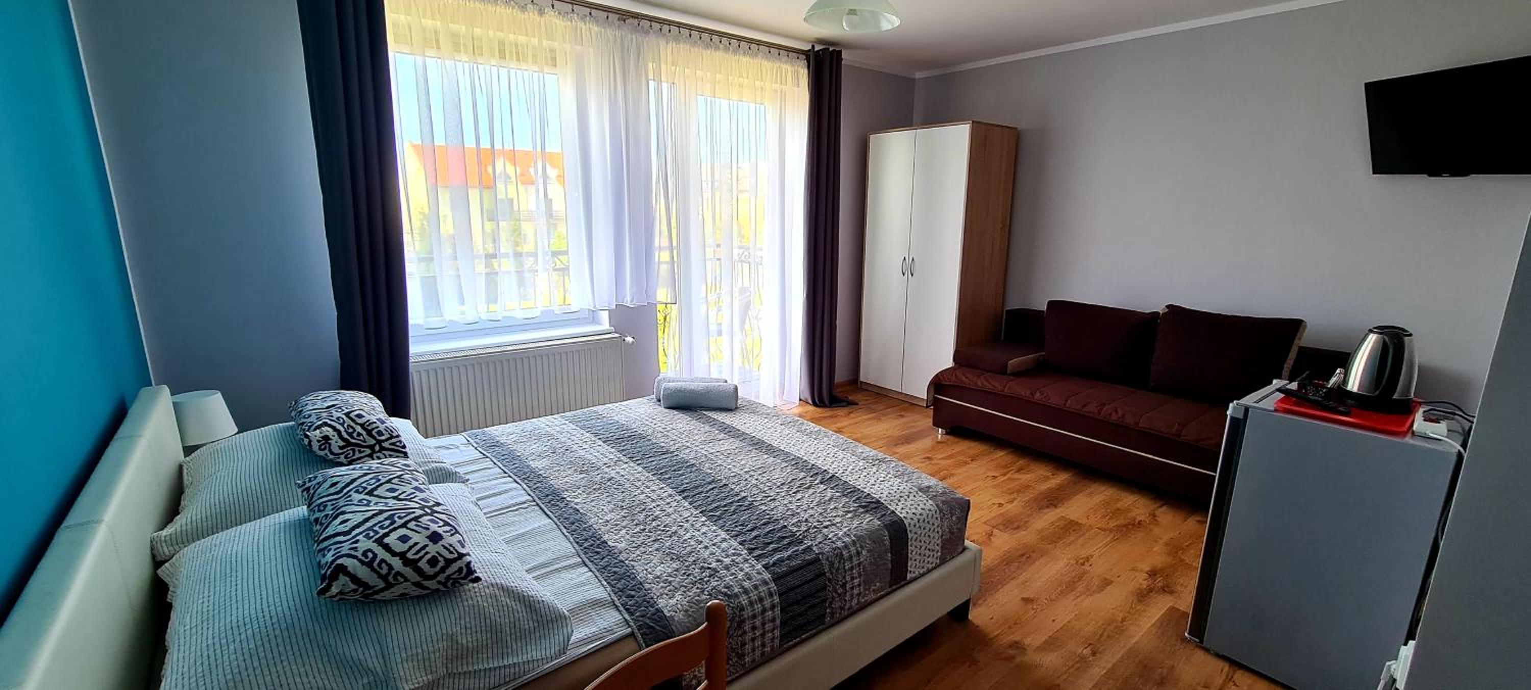Quadruple Room with Balcony photo 2
