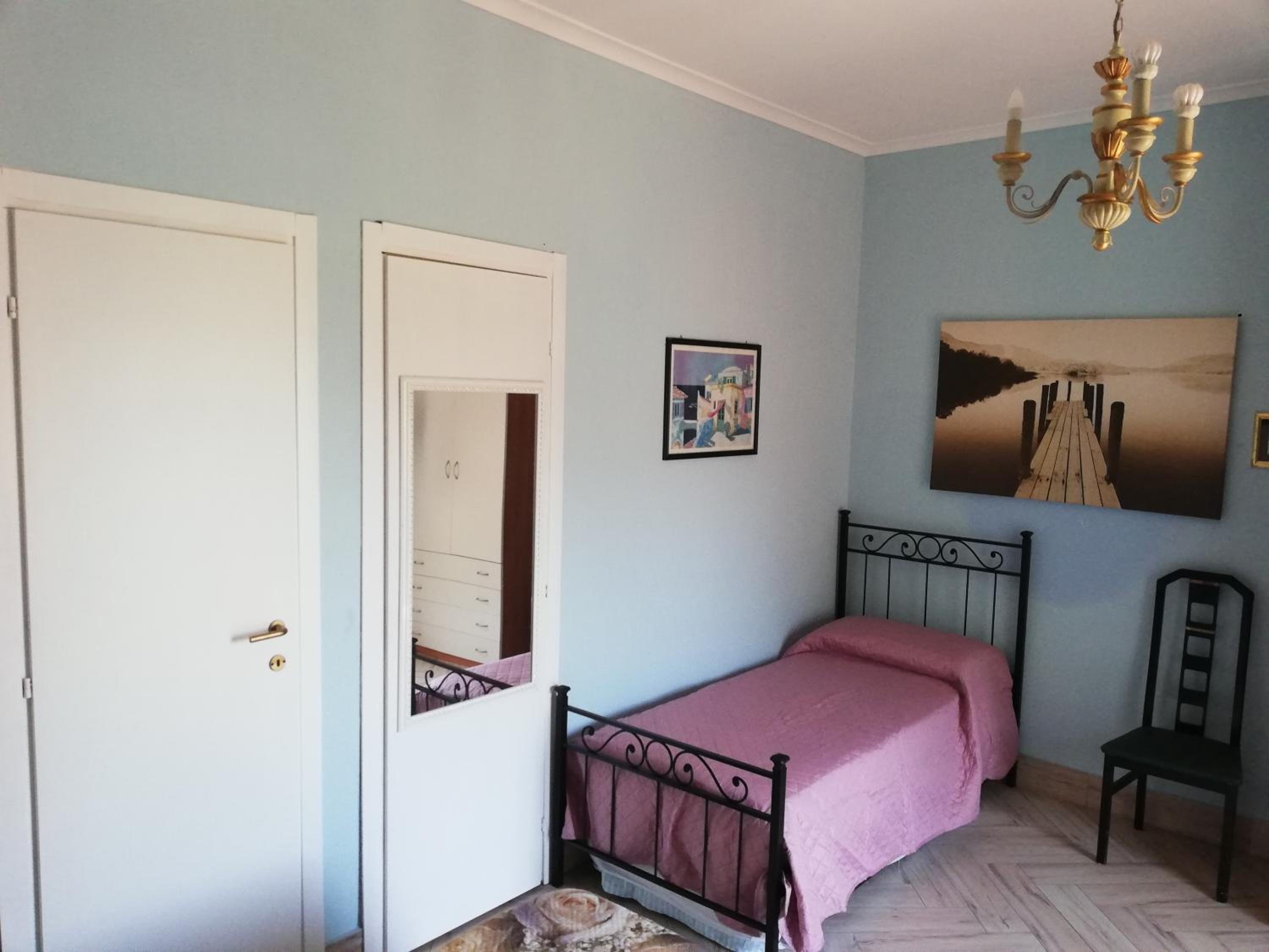 Quadruple Room with Private Bathroom