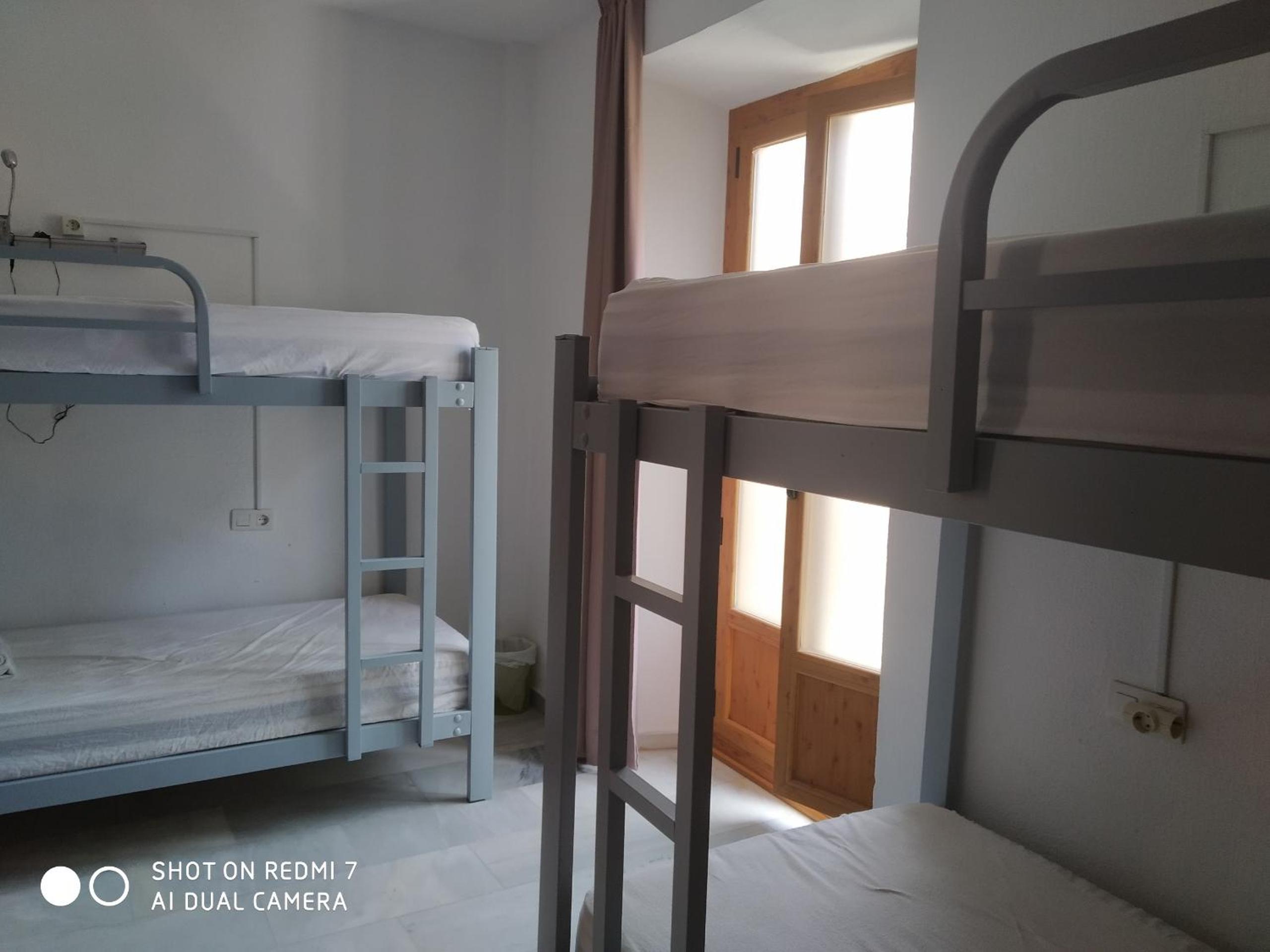 Habitación Cuádruple Económica con Baño Compartido