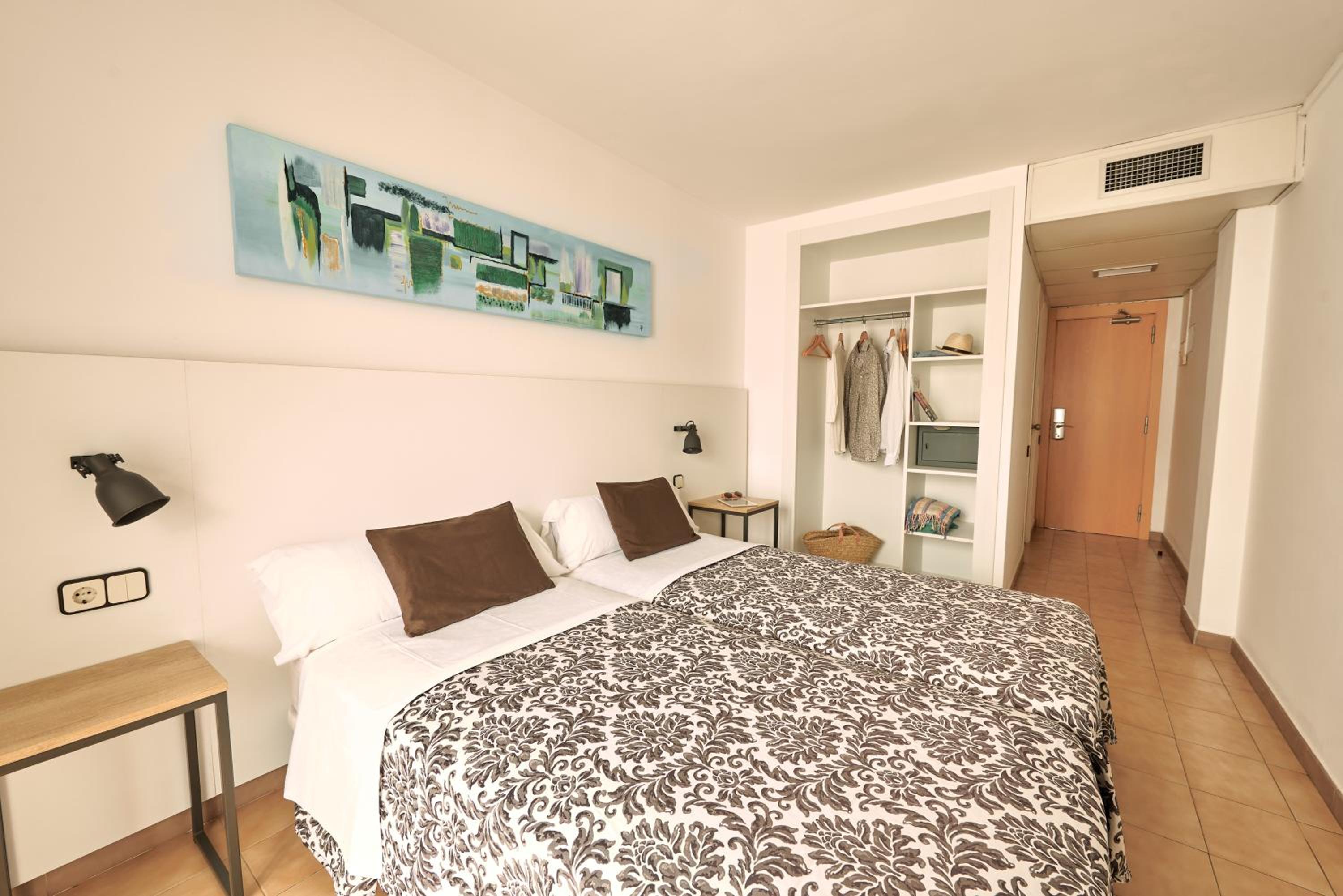 Habitación Familiar Triple con Balcón