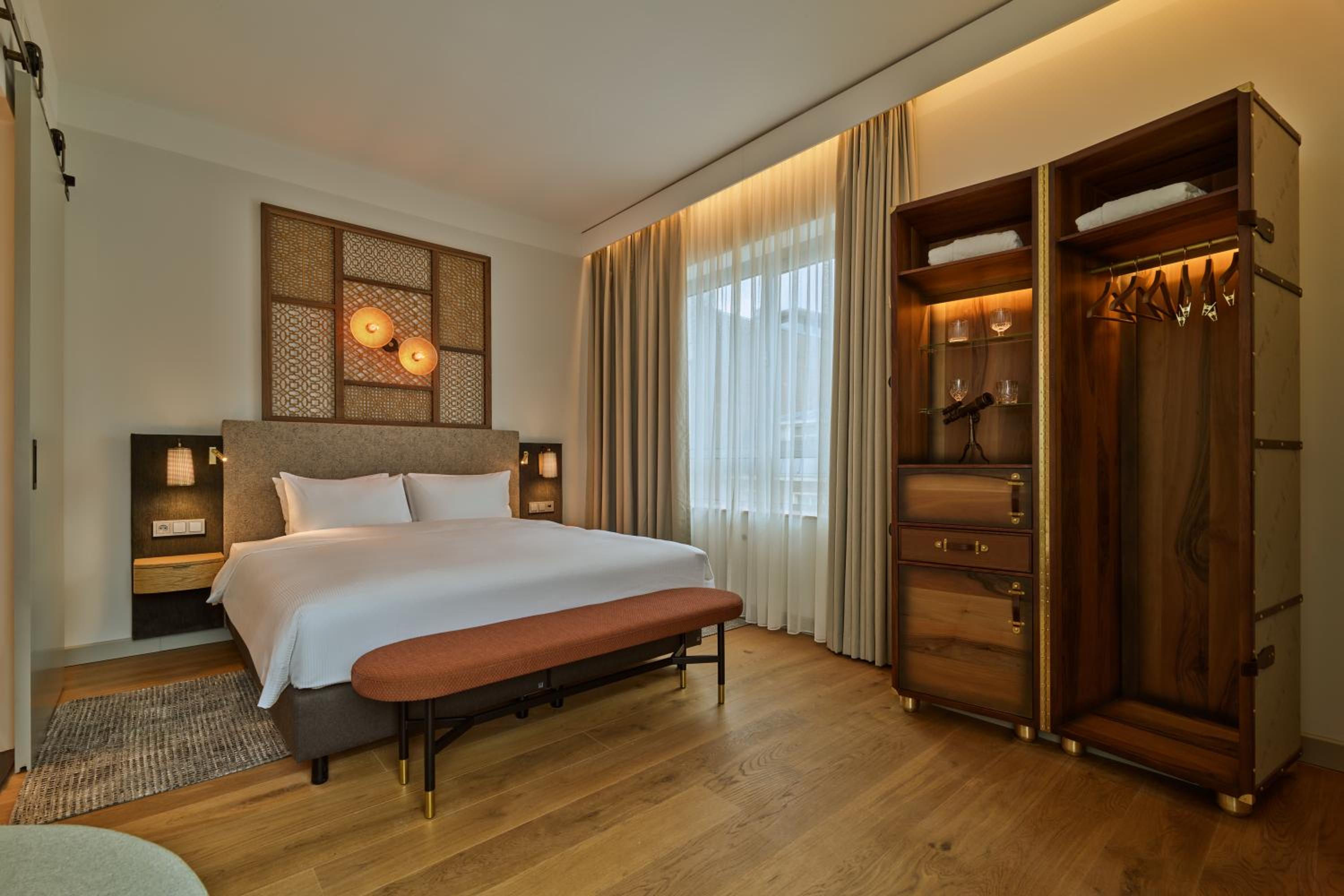 King Suite with Balcony - Photo 1