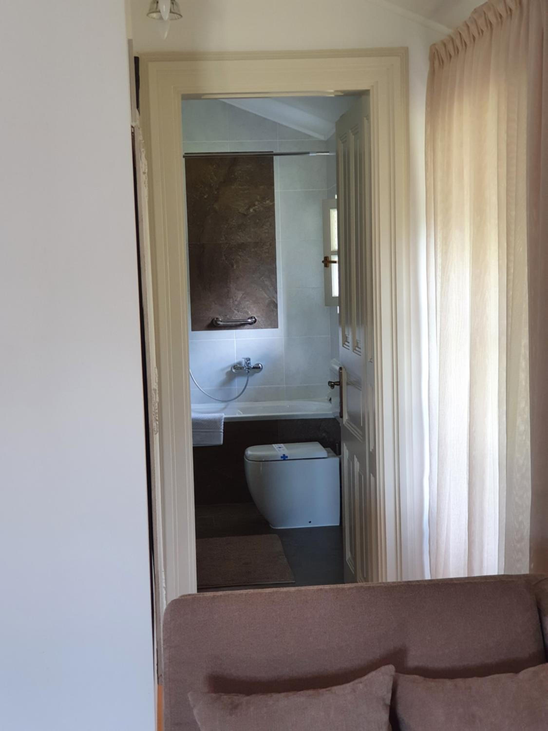 Deluxe Triple Room - Photo 8