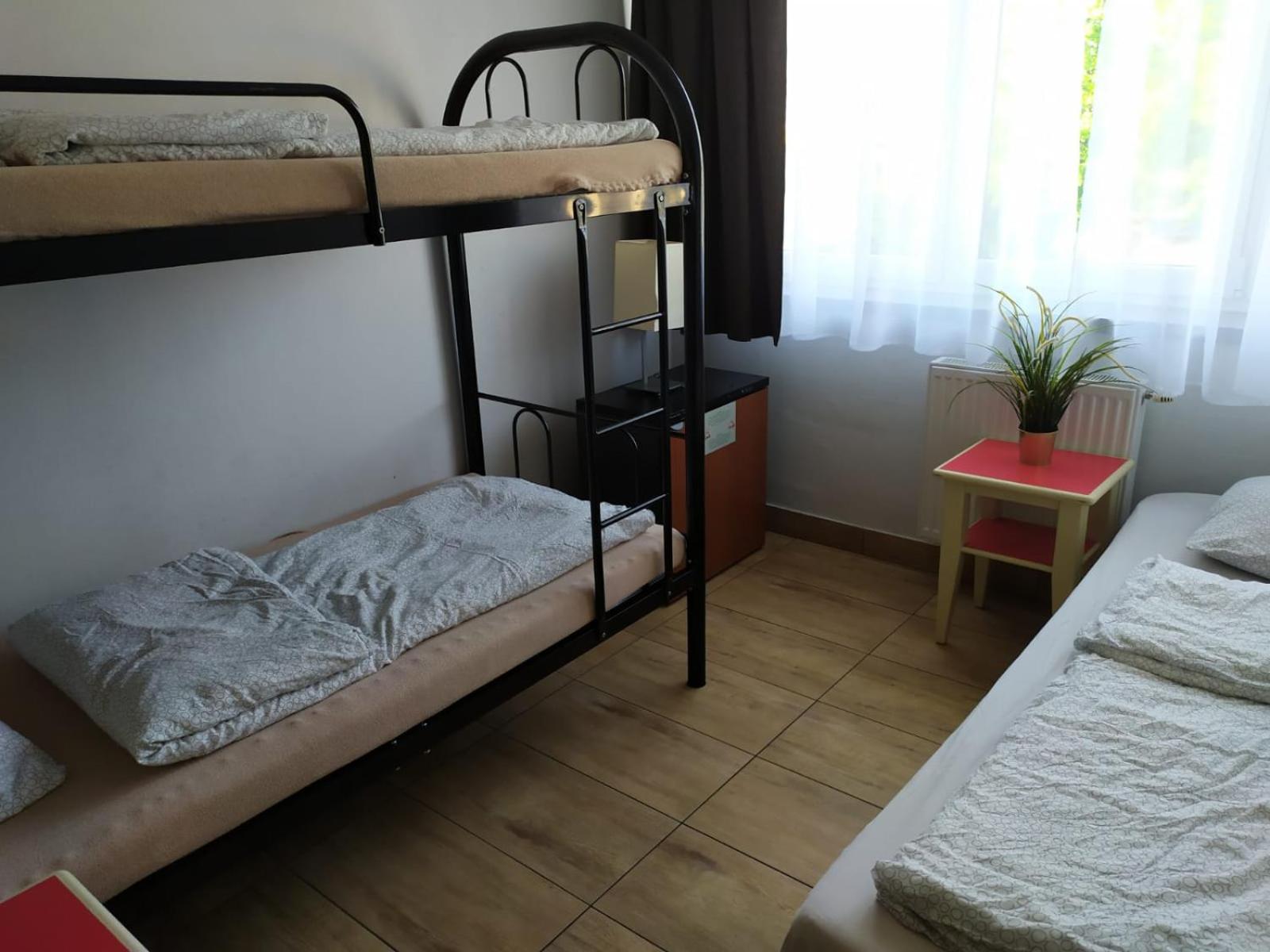 Basic Triple Room with Shared Bathroom photo 2