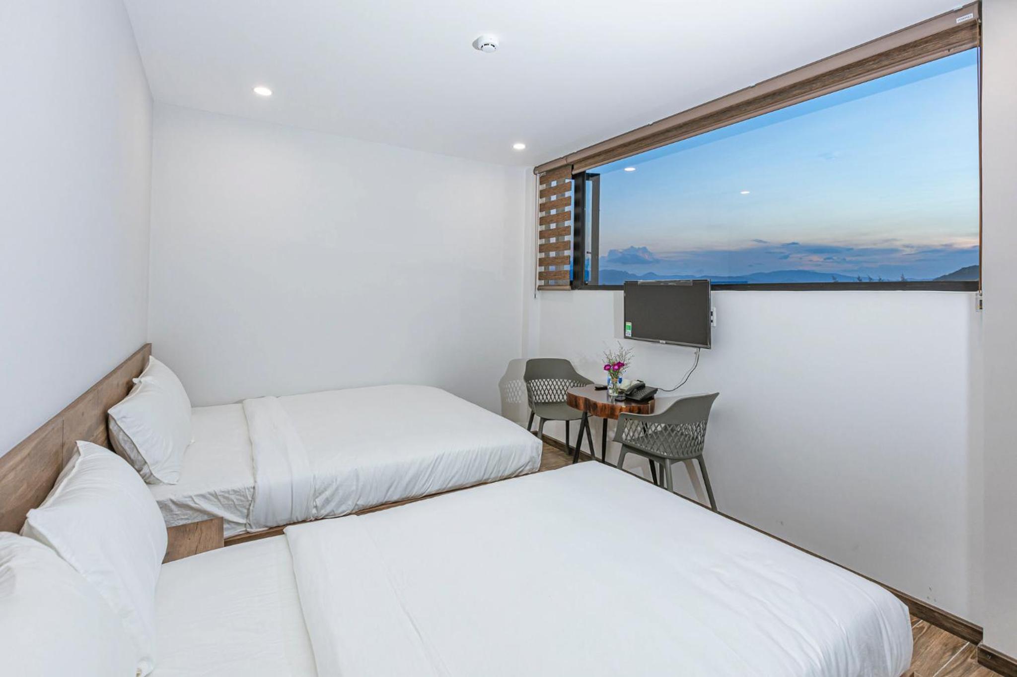 Triple Room - Photo 1