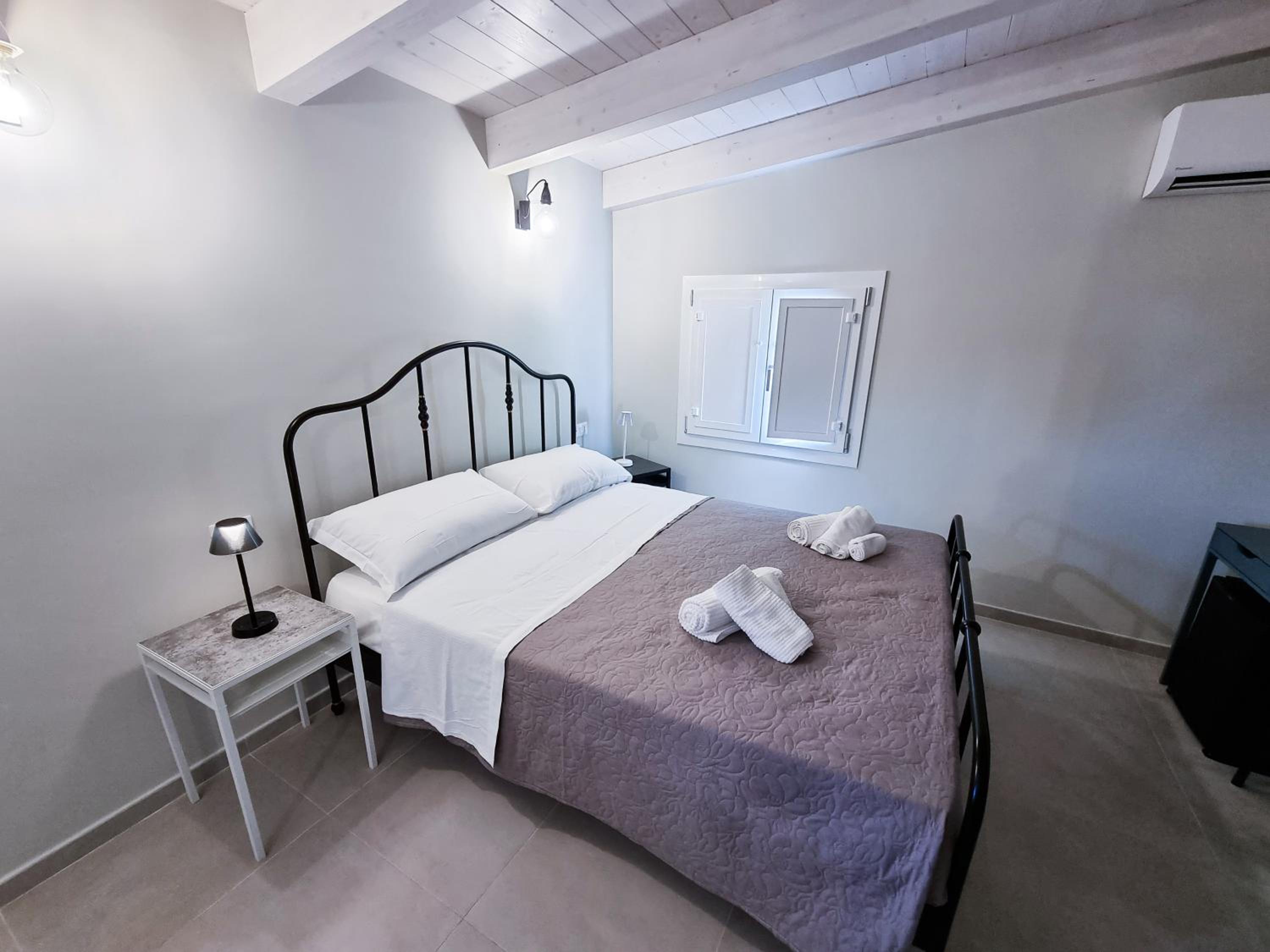 Deluxe Triple Room - Photo 16
