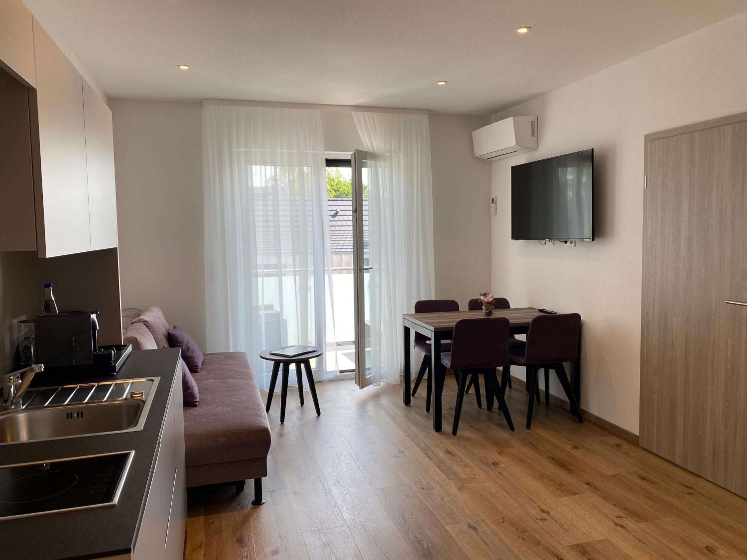 Two-Bedroom Apartment - Photo 12