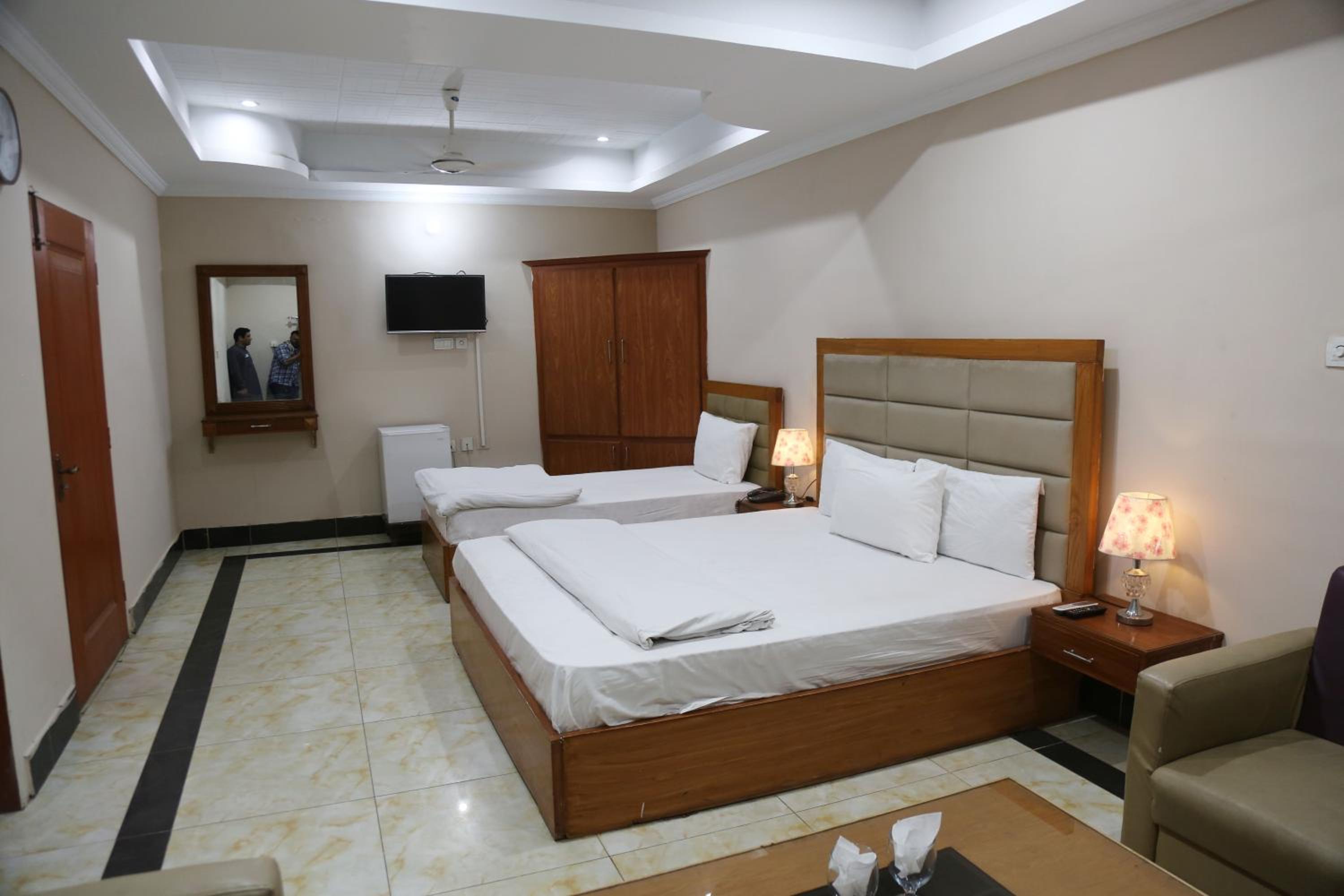 Deluxe Triple Room - Photo 8