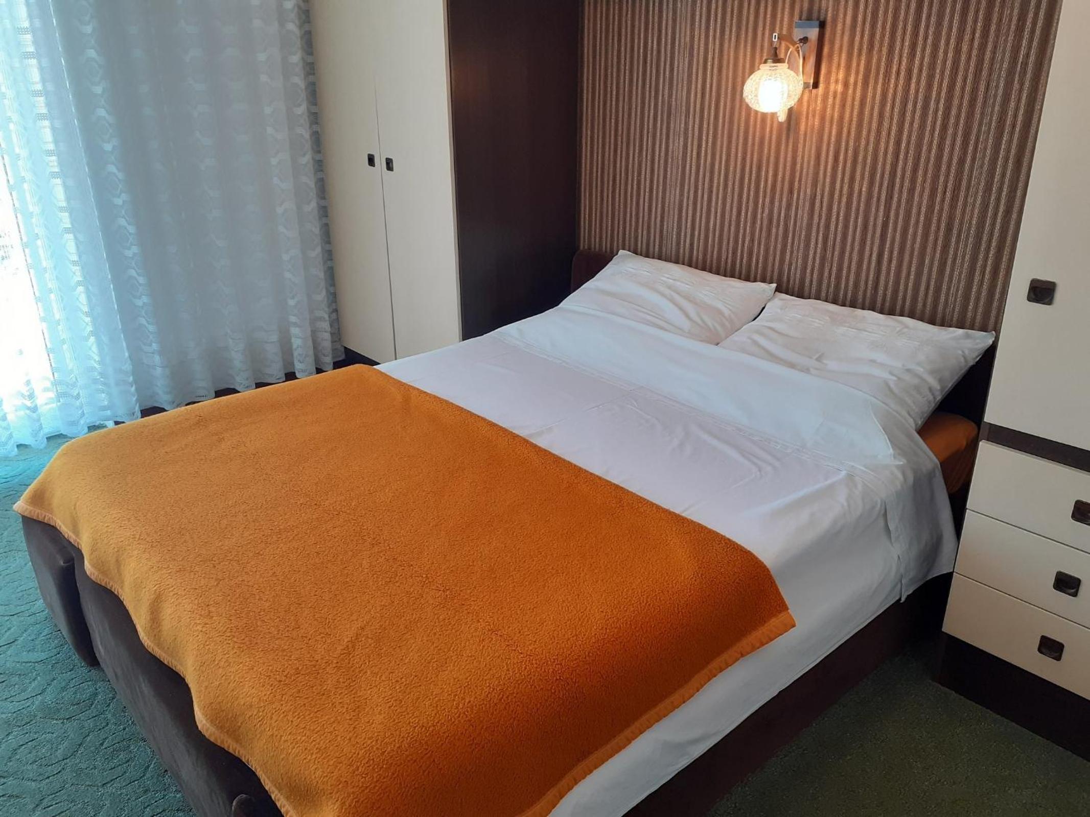 Three-Bedroom Apartment with Balcony