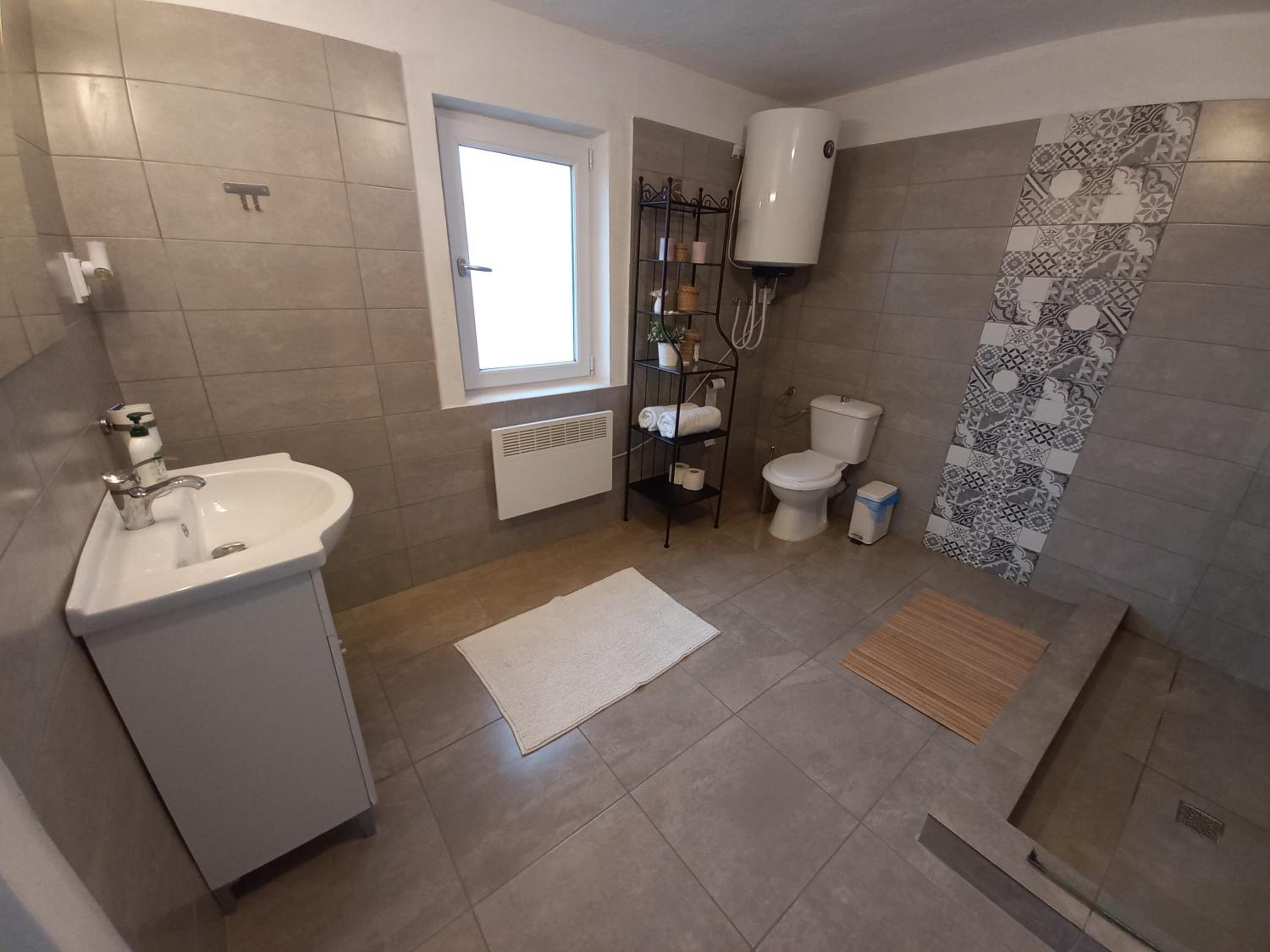 Four-Bedroom House - Photo 44