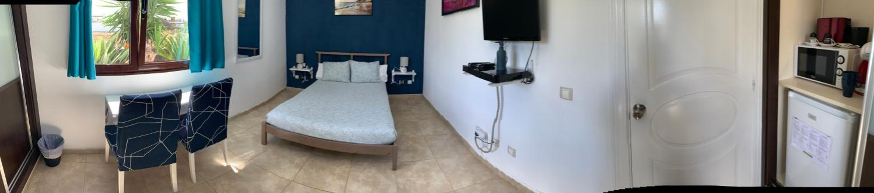 Habitación doble con baño compartido