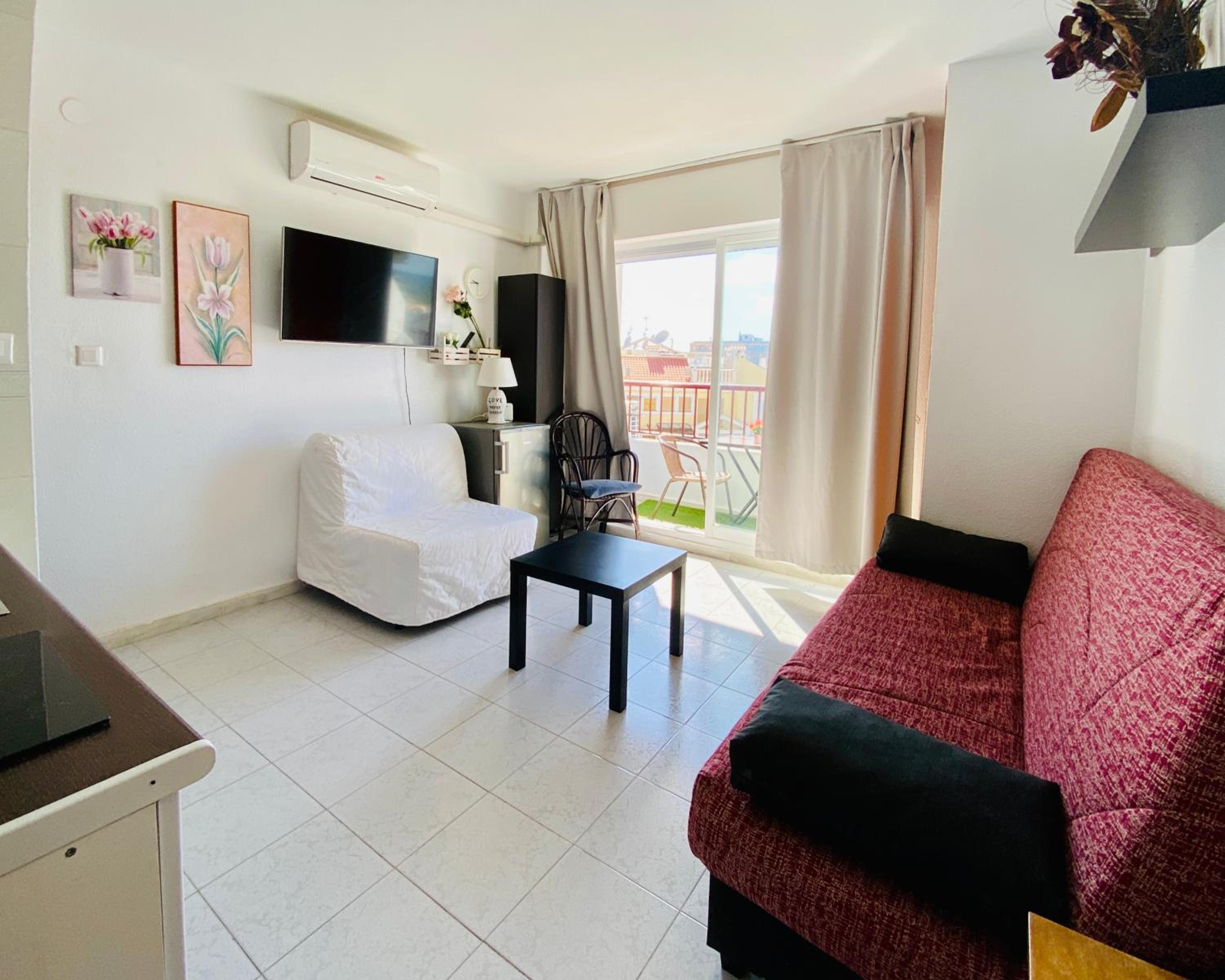 Estudio con sofá cama