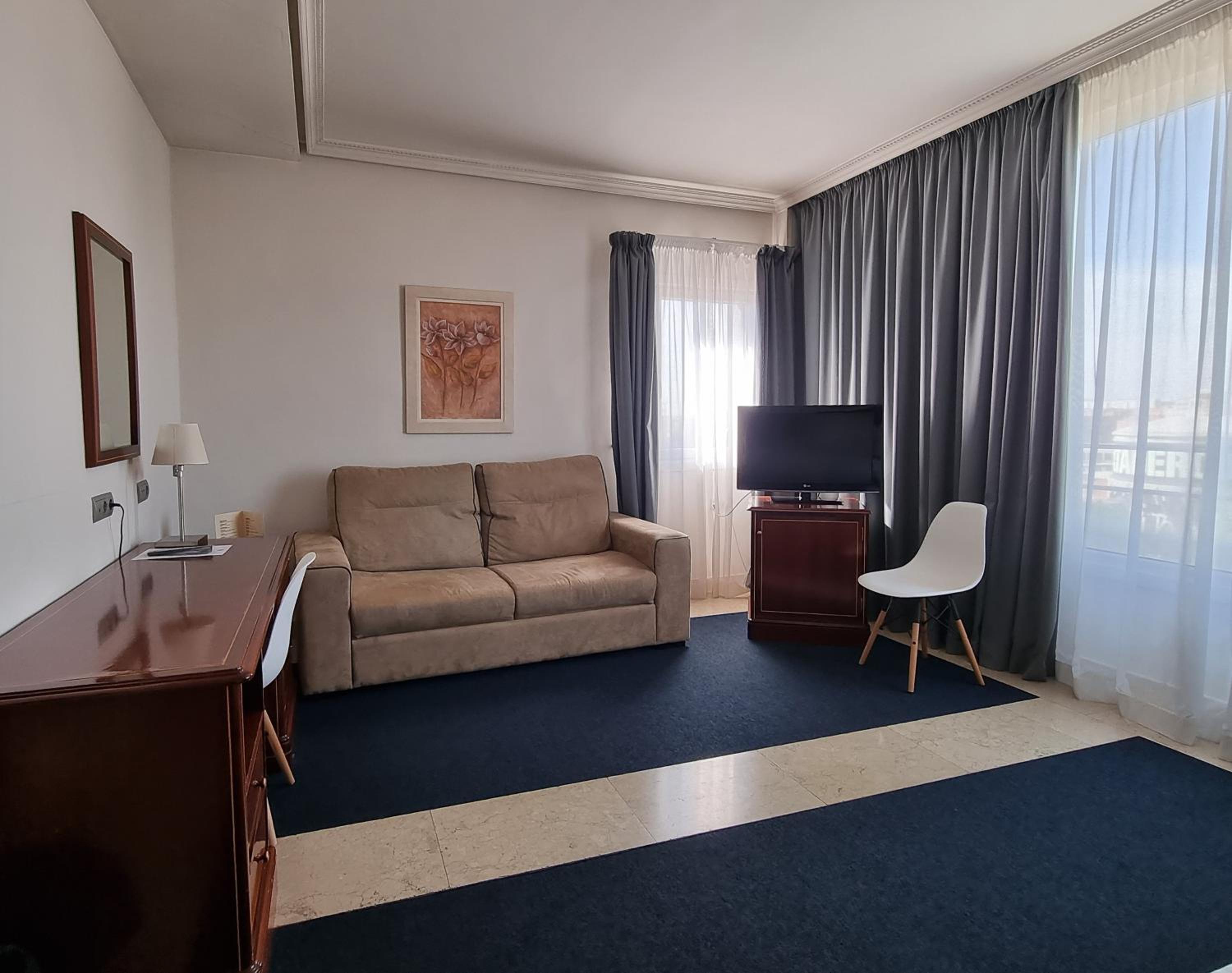 Habitación triple (2 adultos + 1 niño)